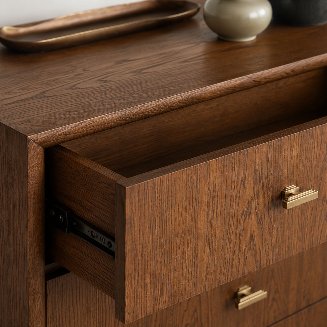 Close-up of Chest of Drawers 02 in dark stained oak showing the open drawer, brass handle and drawer runner detail