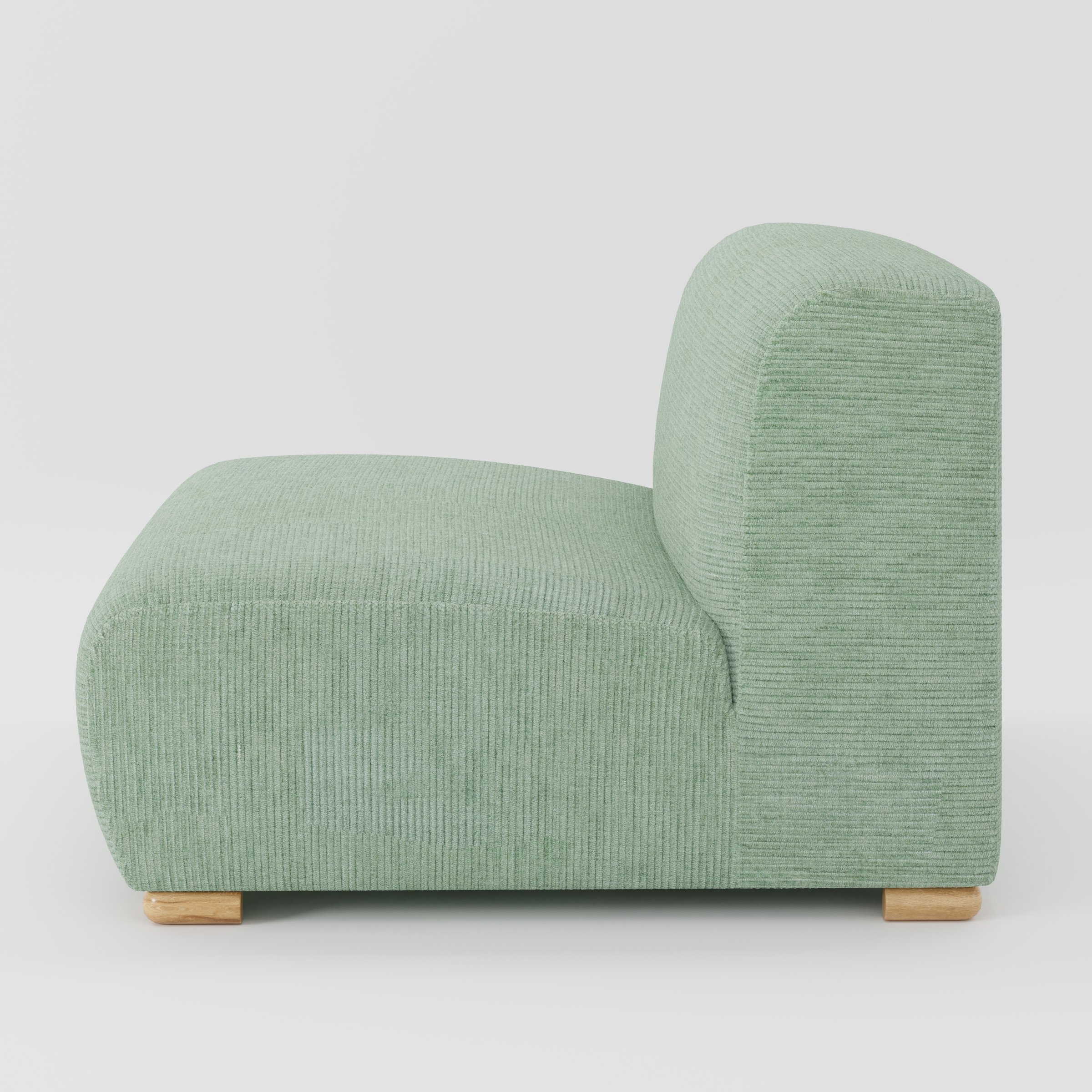 Tay single sofa unit in Caldey Velvet Corduroy Eucalyptus shown from the side showing the low backrest, deep seat and timber feet.