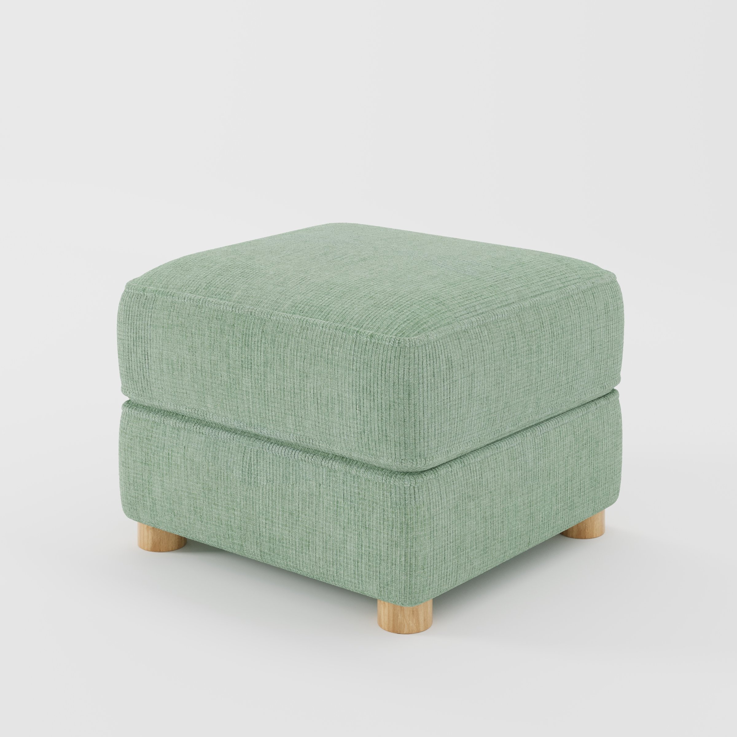 Fergus footstool in Caldey Velvet Corduroy Eucalyptus shown at a diagonal angle highlighting compact proportions and rounded wooden feet.