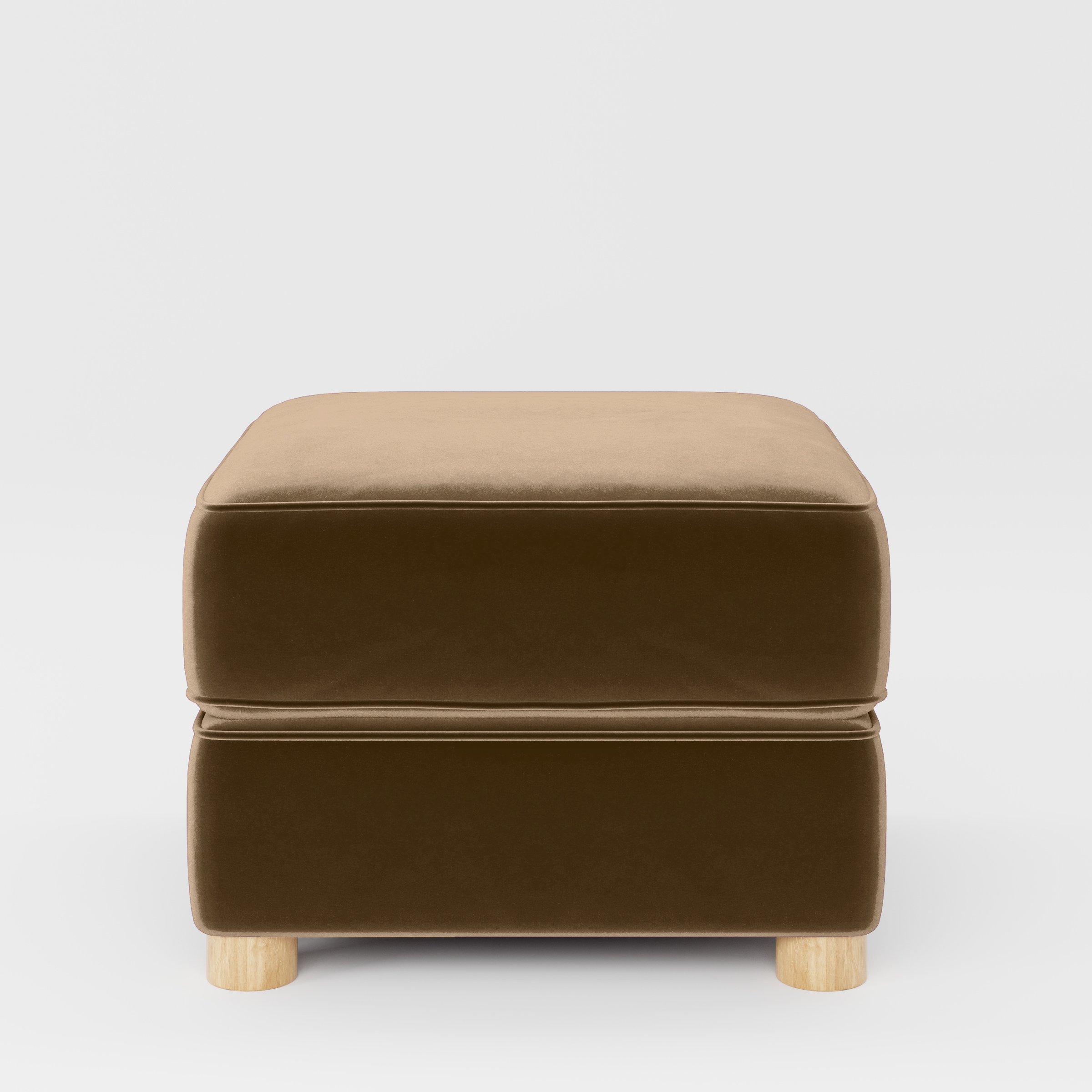 Front view of the Fergus footstool upholstered in Plush EasyClean Velvet in Caribou.