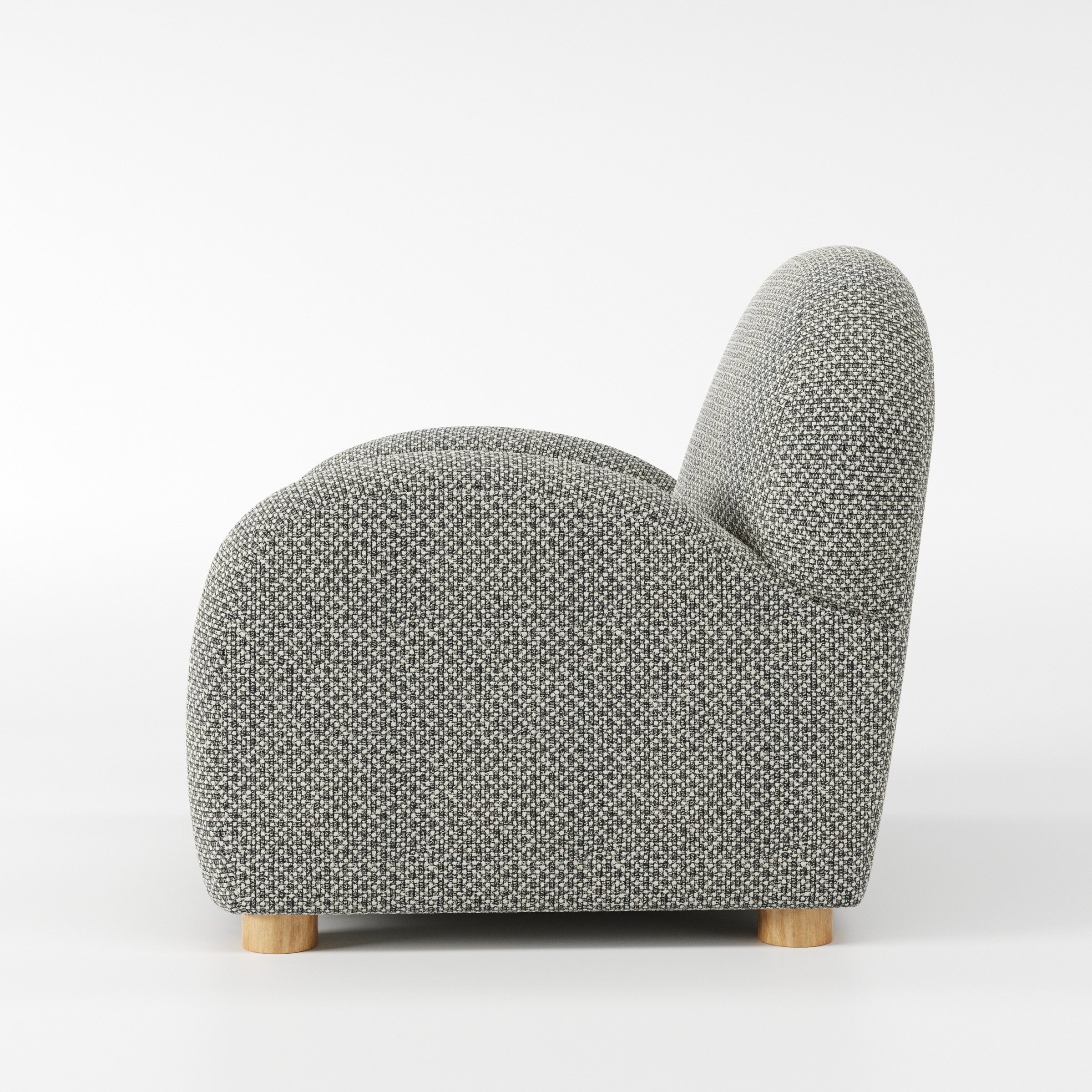 Awe armchair in Rousay Wool Blend Tar and Chalk shown in side profile displaying proportions and overall silhouette.