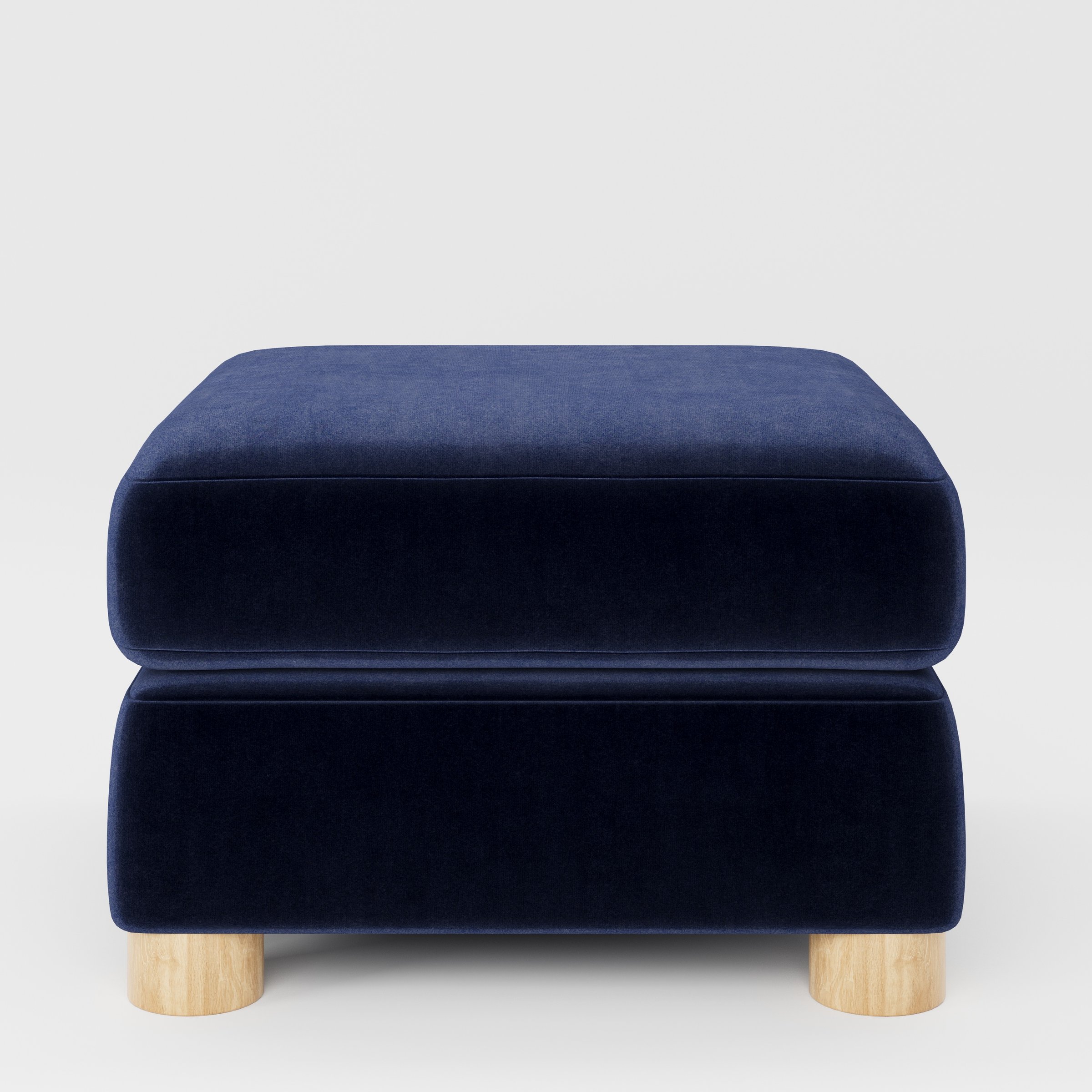 Windermere footstool in Noss Velvet Navy shown front-on against a neutral studio backdrop.