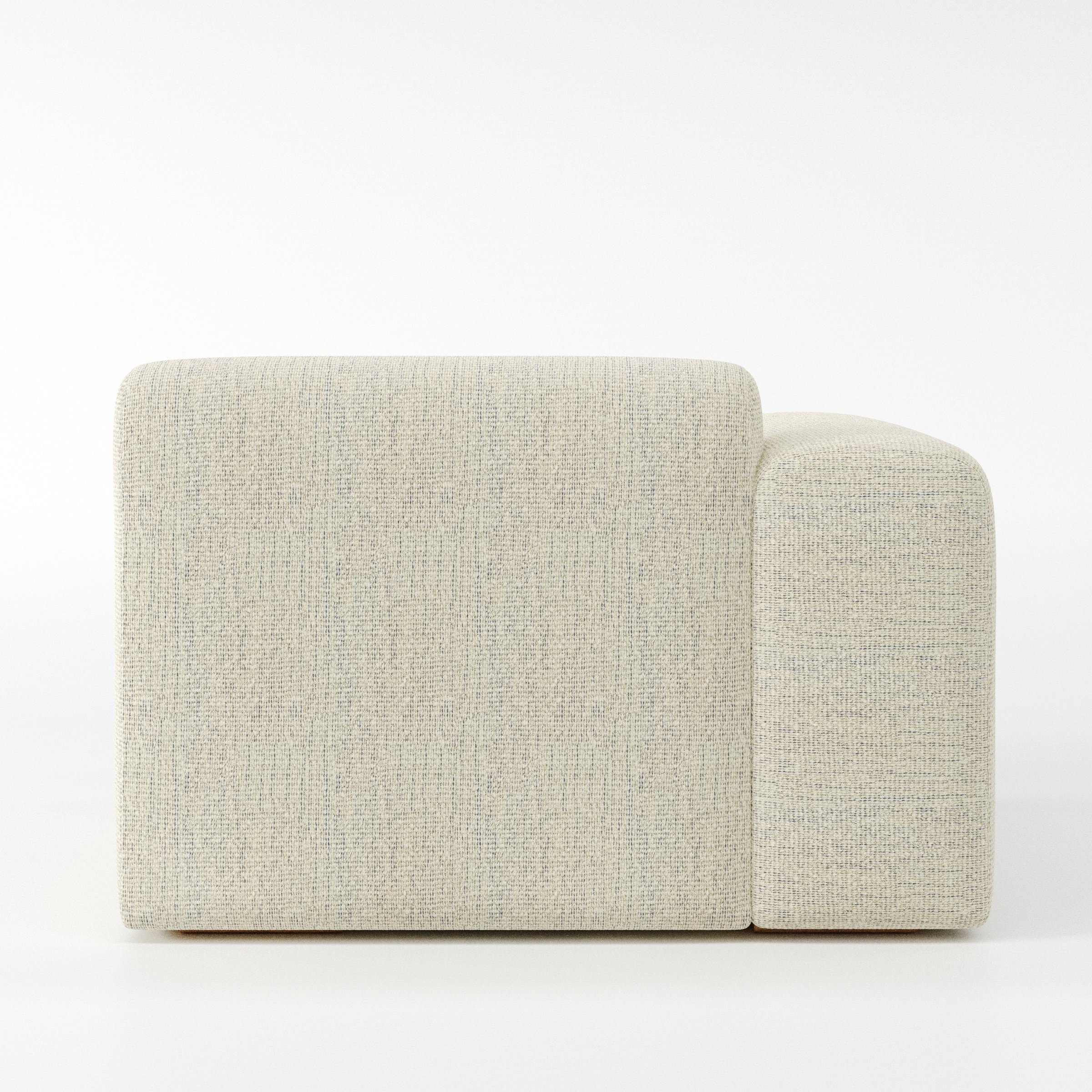 Drumquin modular sofa left side unit in Orsay Bouclé Cream and Marine shown from the back with a smooth, softly curved silhouette and armrest edge visible.