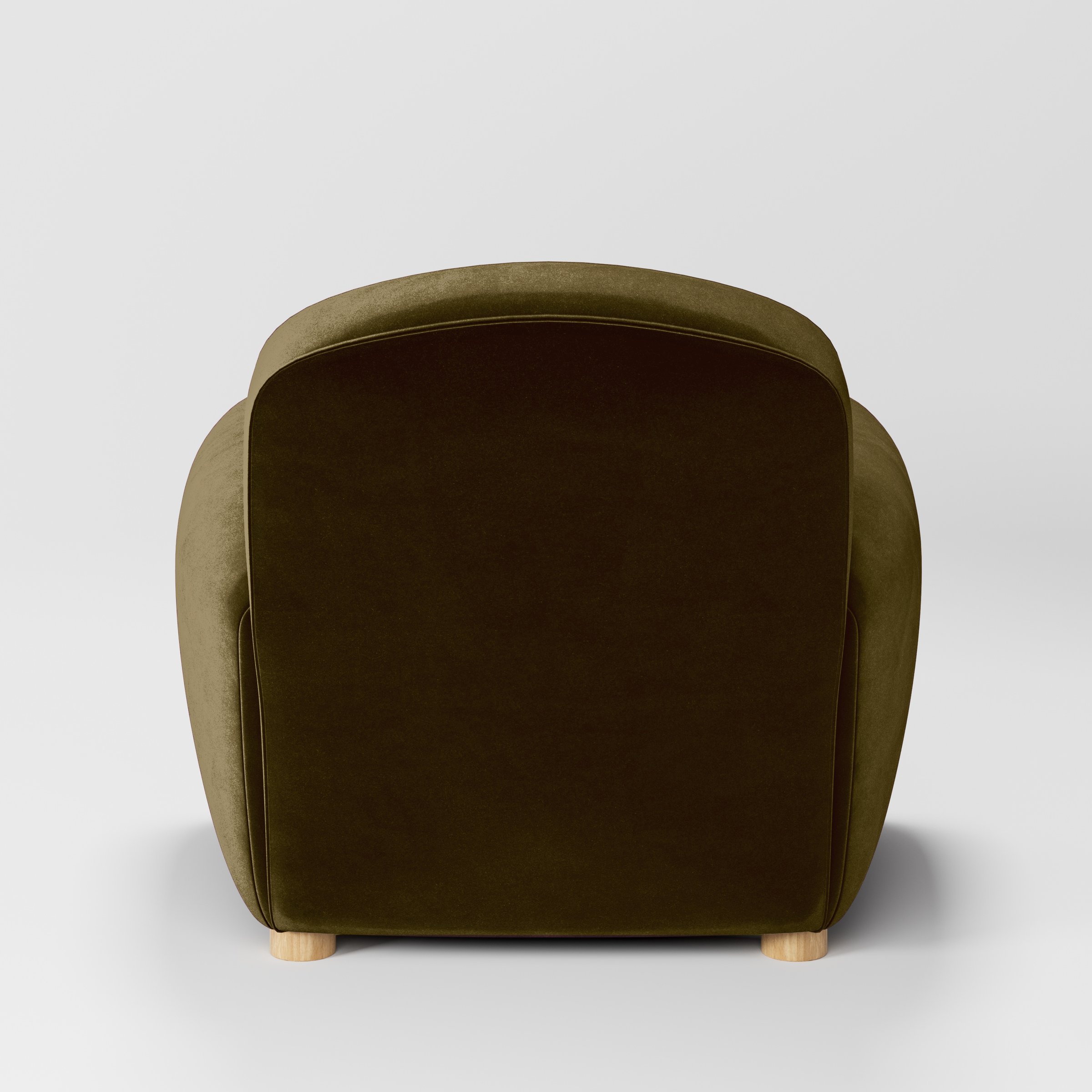 Rear view of the Fergus armchair upholstered in Plush EasyClean Velvet in Cedar.