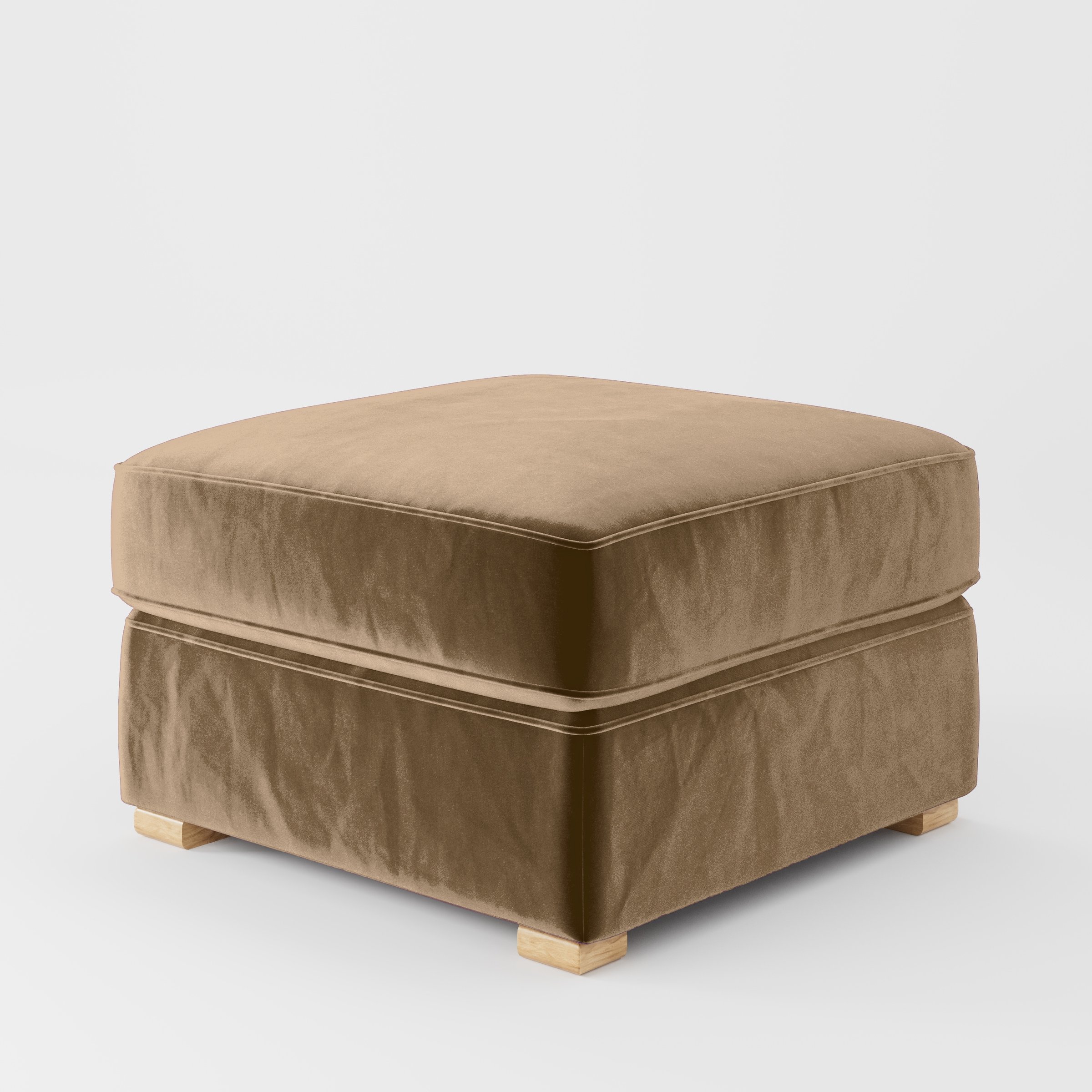Diagonal view of the Cashel footstool upholstered in Plush EasyClean Velvet in Caribou.