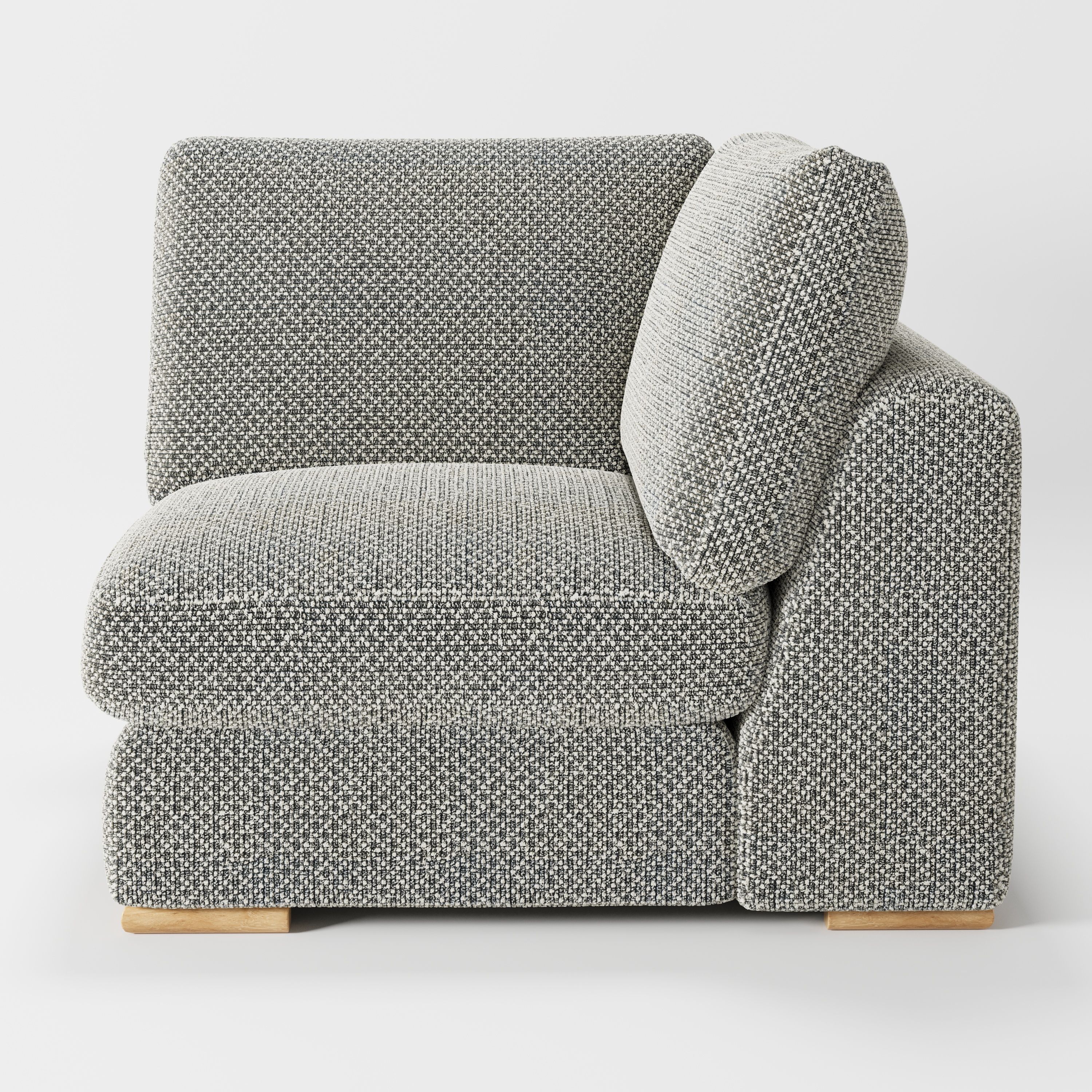 Olton corner unit in Rousay wool blend tar and chalk fabric, right side view emphasising cushion support and texture