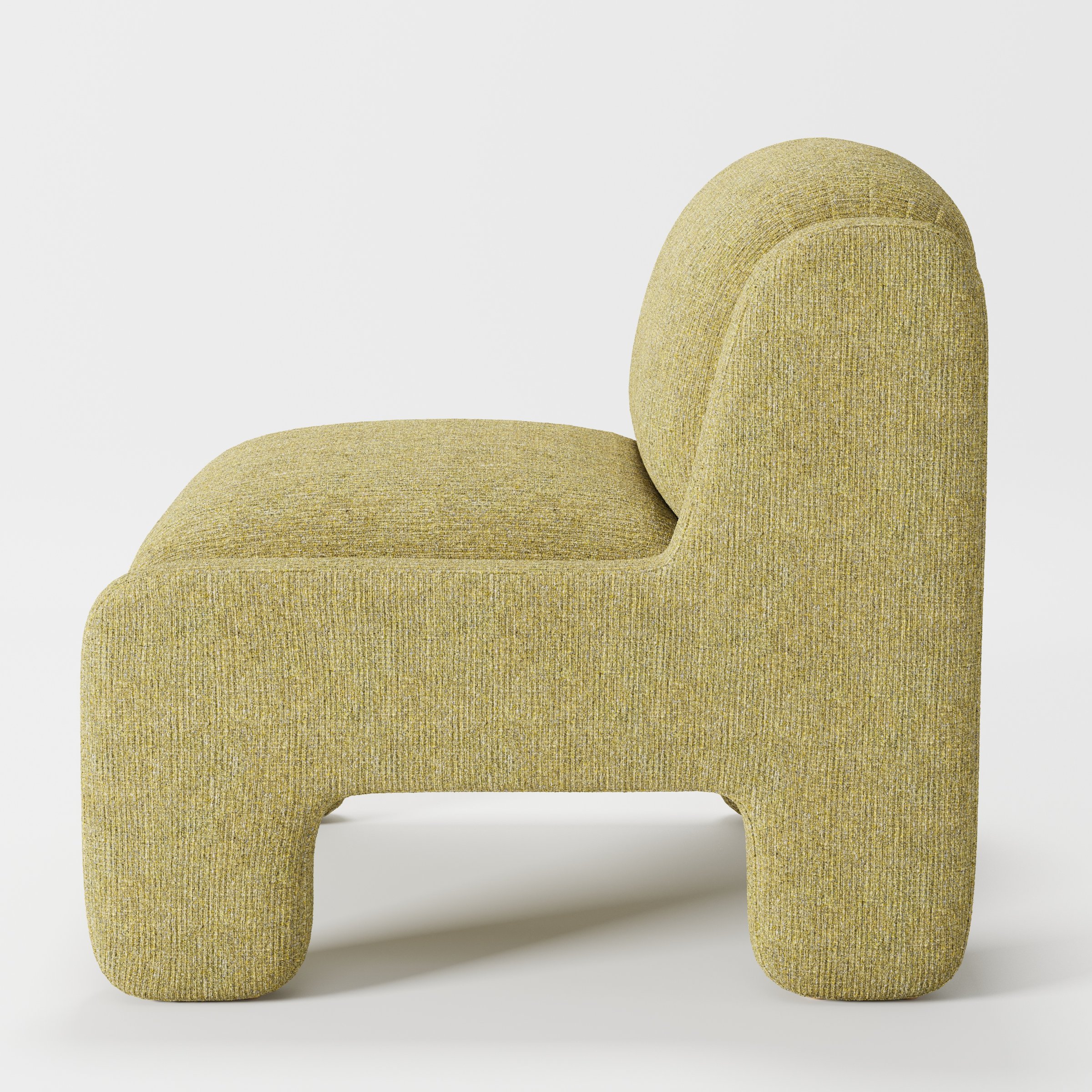 Inny armchair in Heyling Tweed Sencha shown in side profile displaying proportions and overall silhouette.