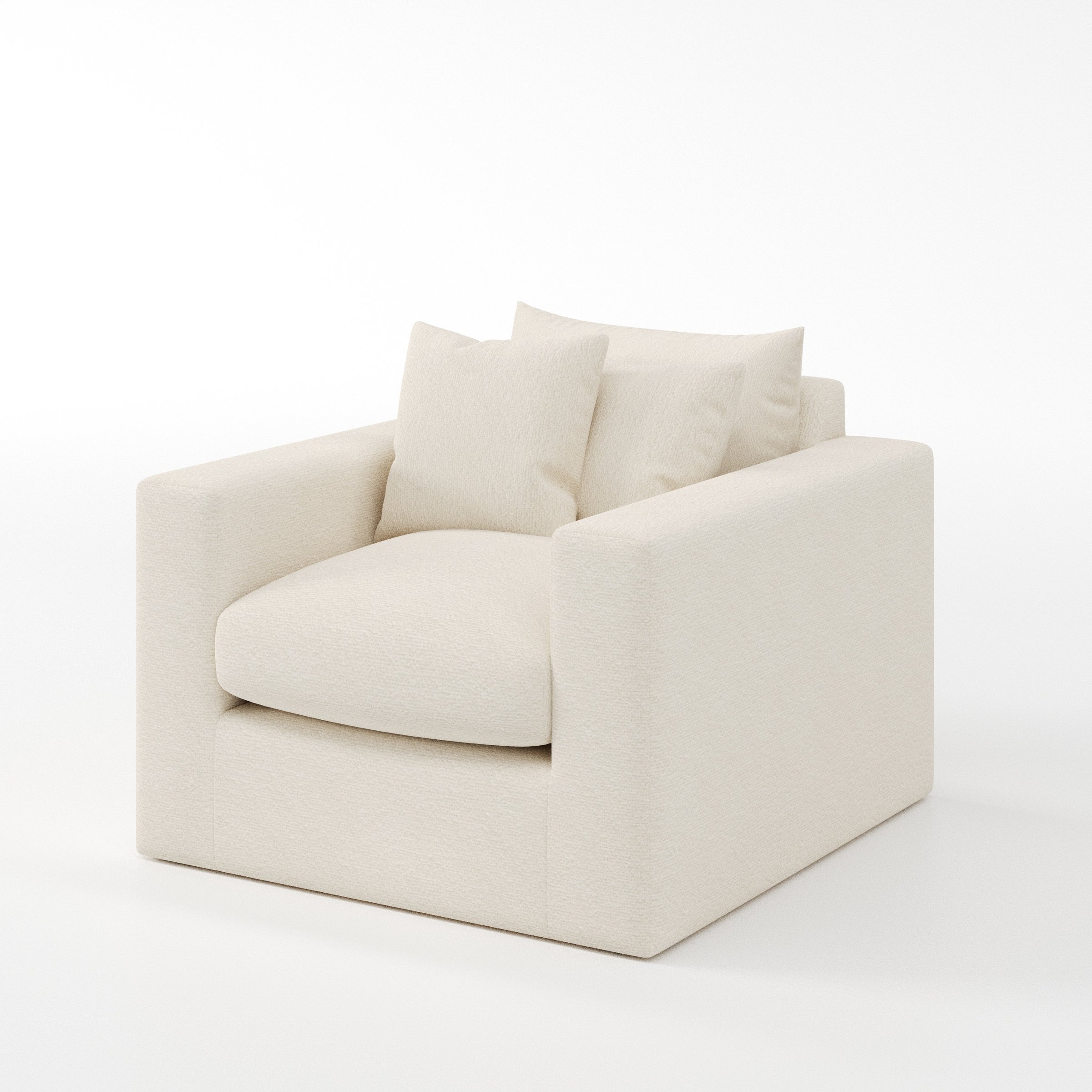 Coniston armchair in Kilda Boucle Cream shown at a diagonal angle highlighting arms and seat depth.