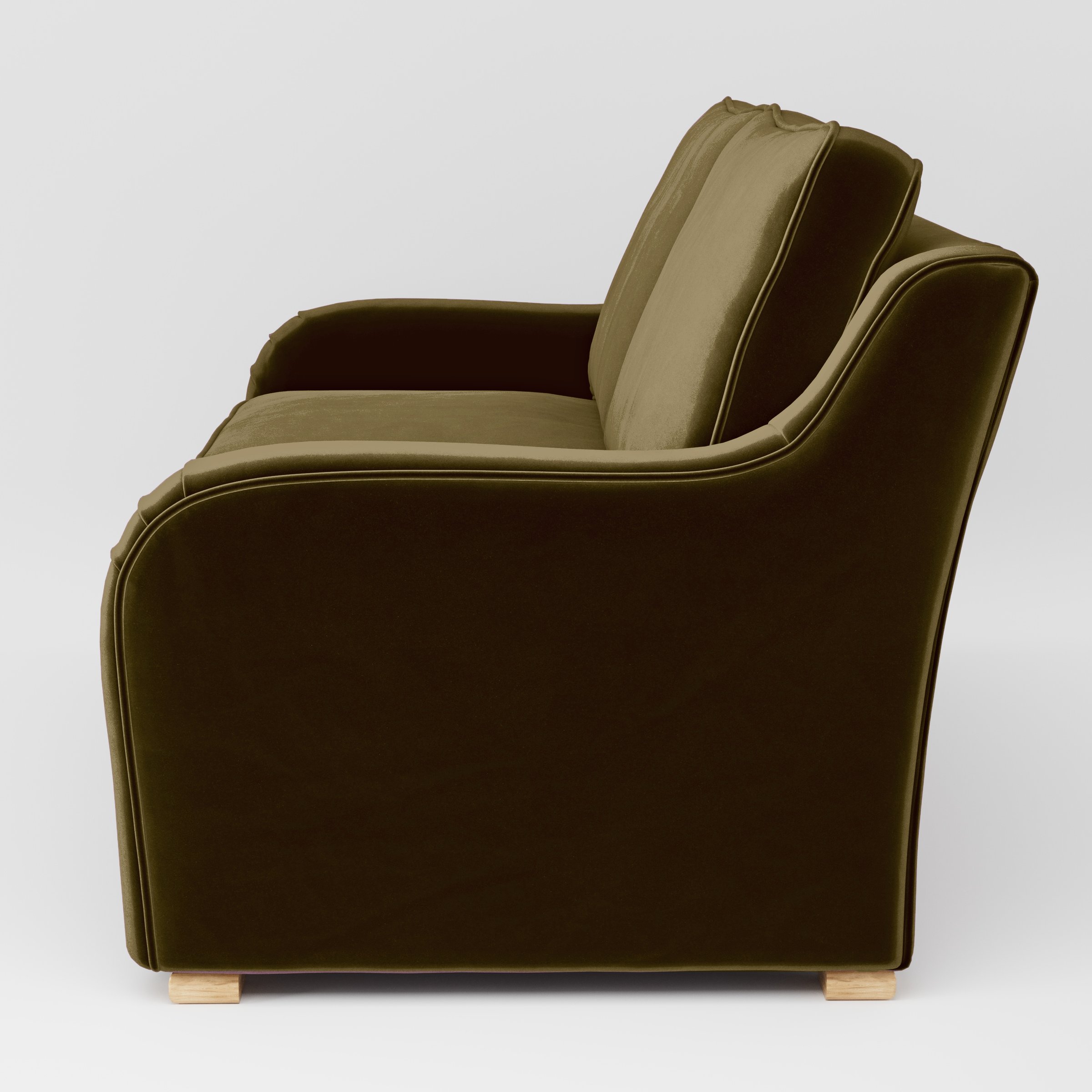 Side view of the Cashel sofa upholstered in Plush EasyClean Velvet in Cedar.