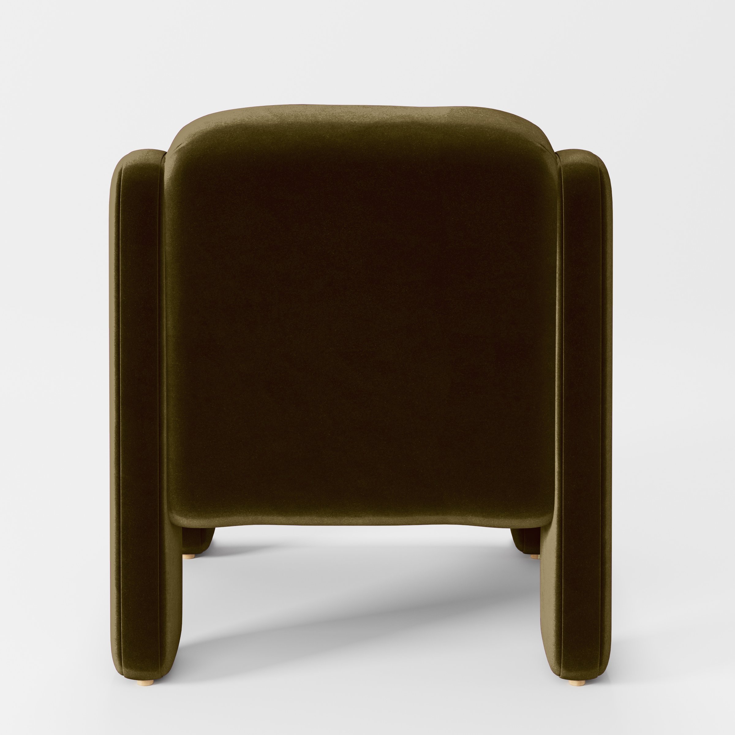 Rear view of the Inny armchair upholstered in Plush EasyClean Velvet in Cedar.