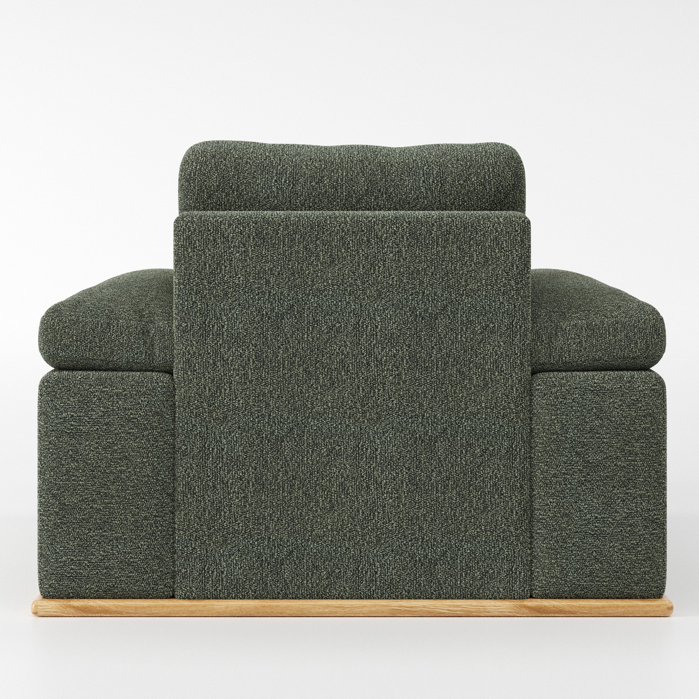 Cusher armchair in Kilda Boucle Moss shown from the rear highlighting backrest shape and upholstery finish.