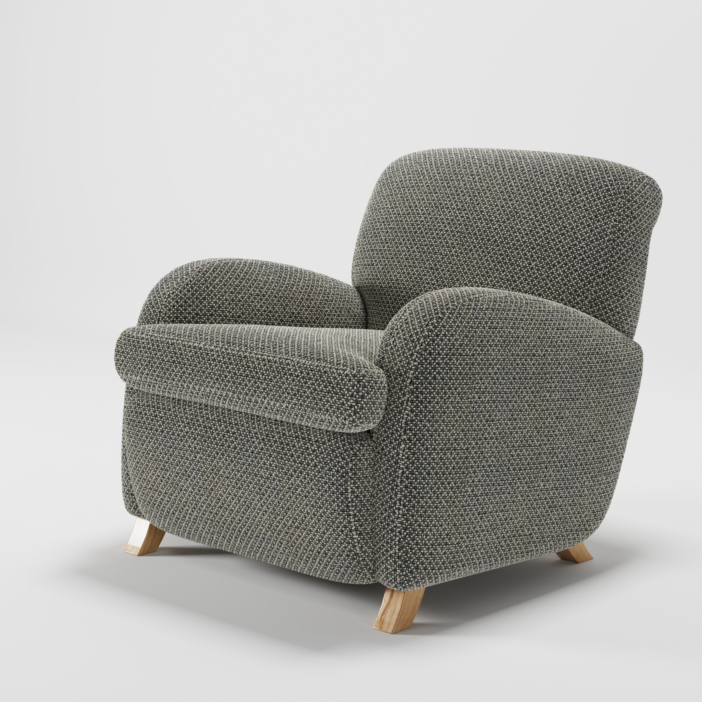 Rye armchair in Rousay Wool Blend Tar and Chalk shown at a diagonal angle highlighting arms and seat depth.