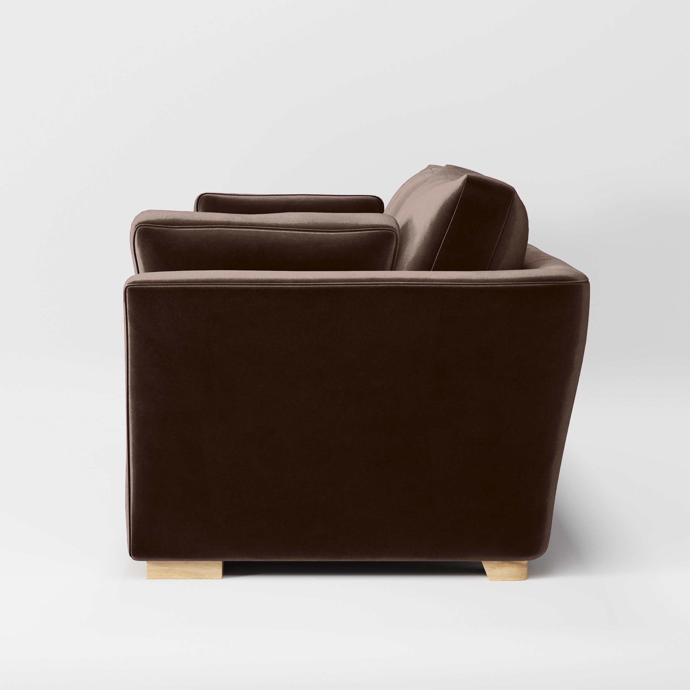 Side view of the Stowe sofa upholstered in Plush EasyClean Velvet in Mole.