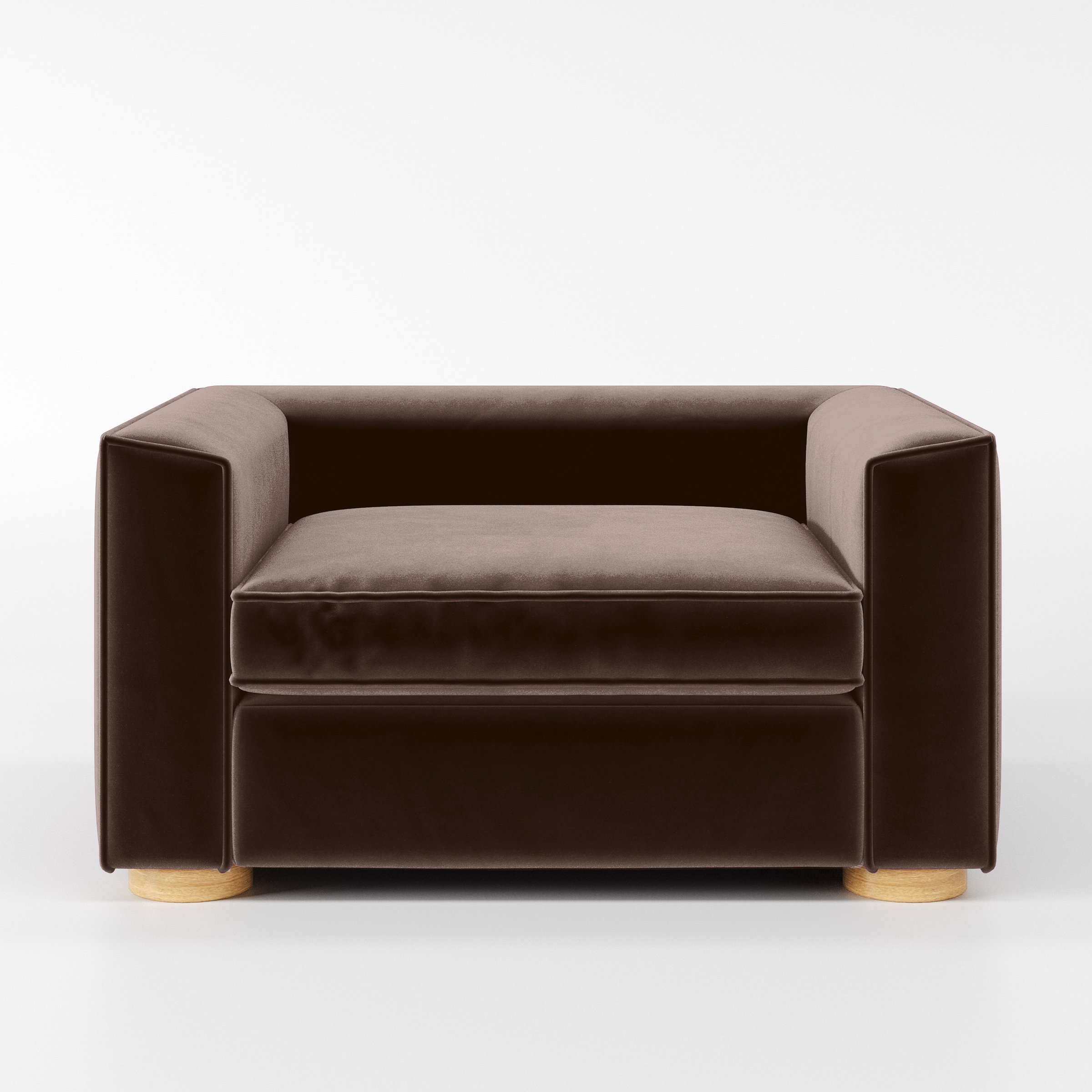 Front view of the Feale armchair upholstered in Plush EasyClean Velvet in Mole.