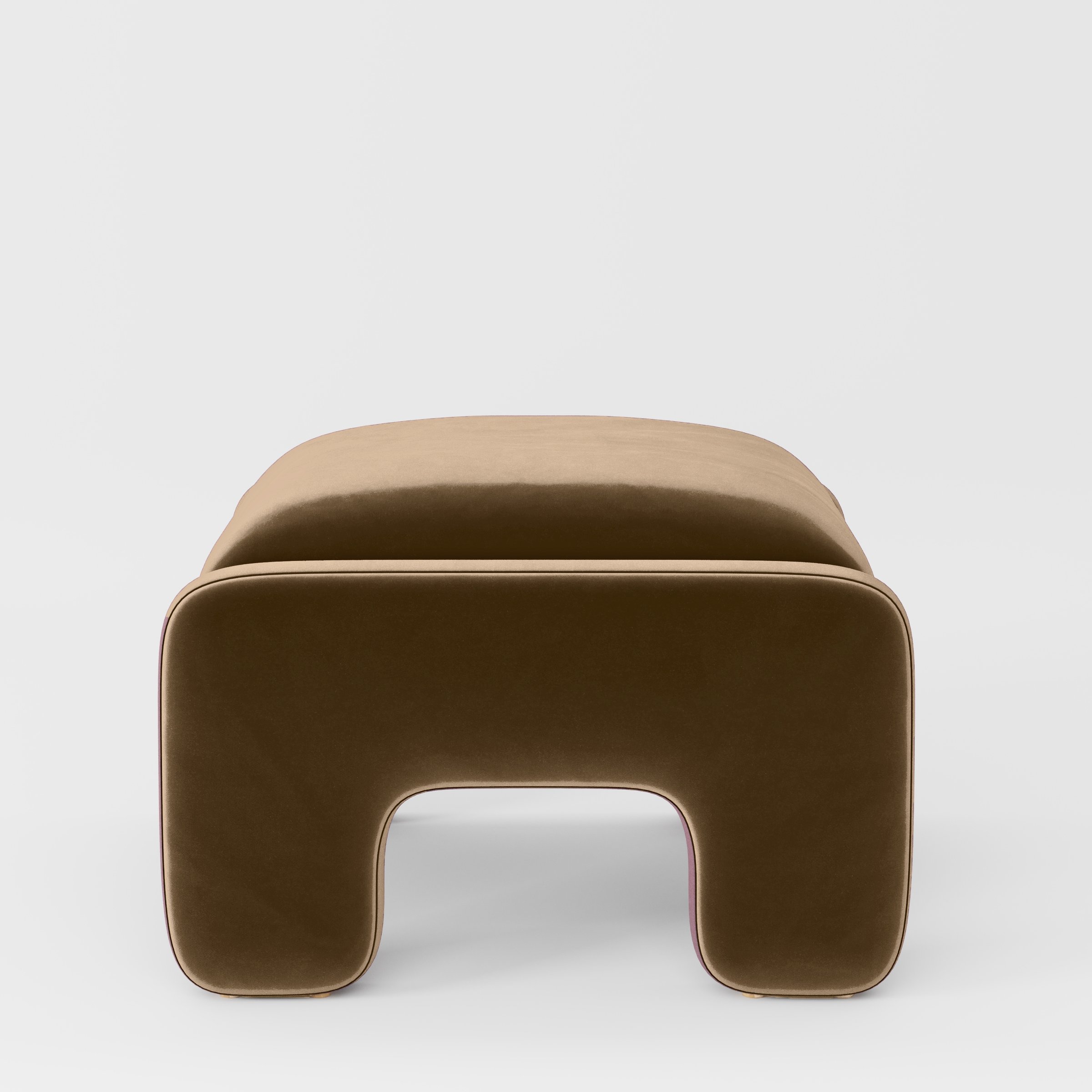 Side view of the Inny footstool upholstered in Plush EasyClean Velvet in Caribou.