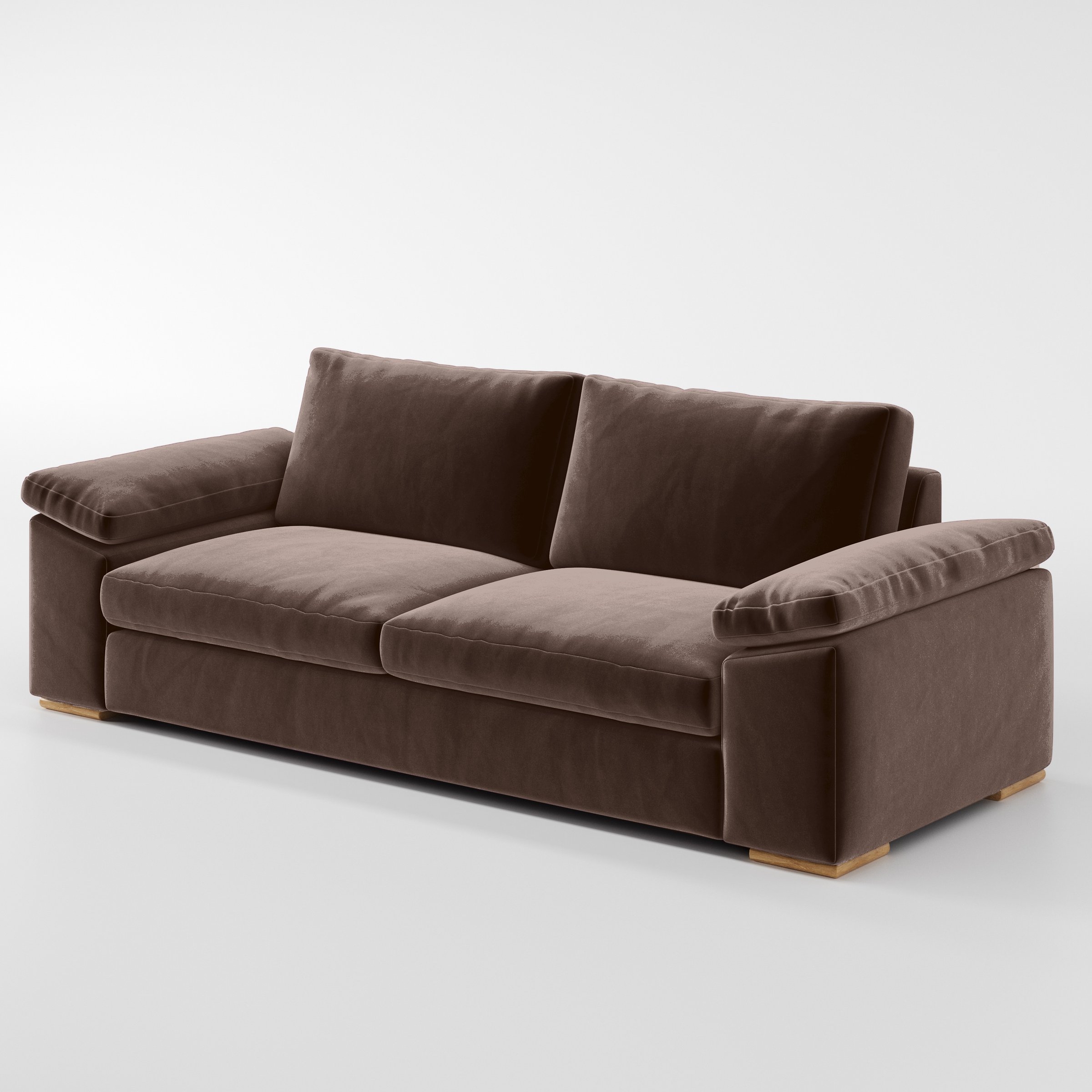 Diagonal view of the Moy sofa upholstered in Plush EasyClean Velvet in Mole.