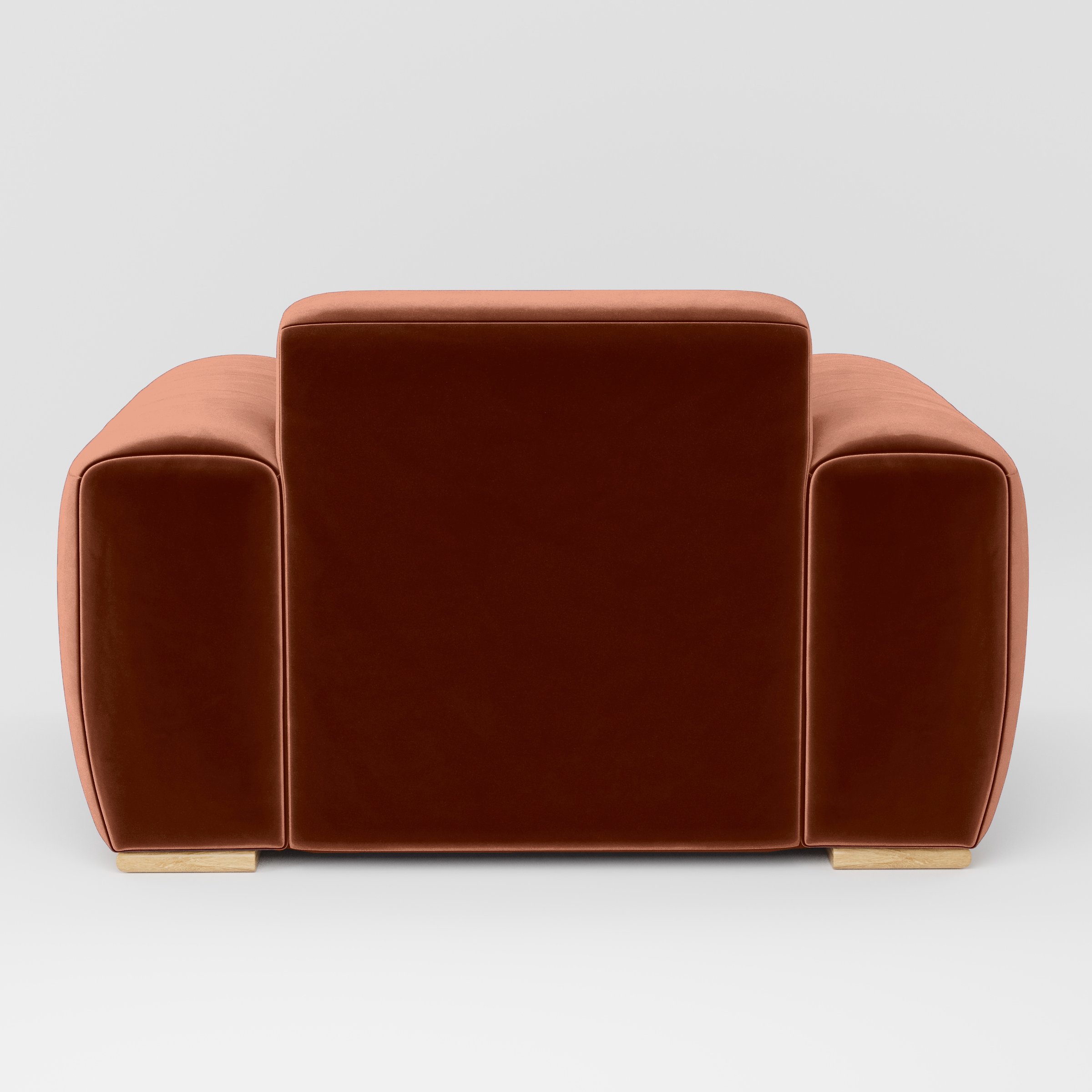 Rear view of the Darwell armchair upholstered in Plush EasyClean Velvet in Apricot.