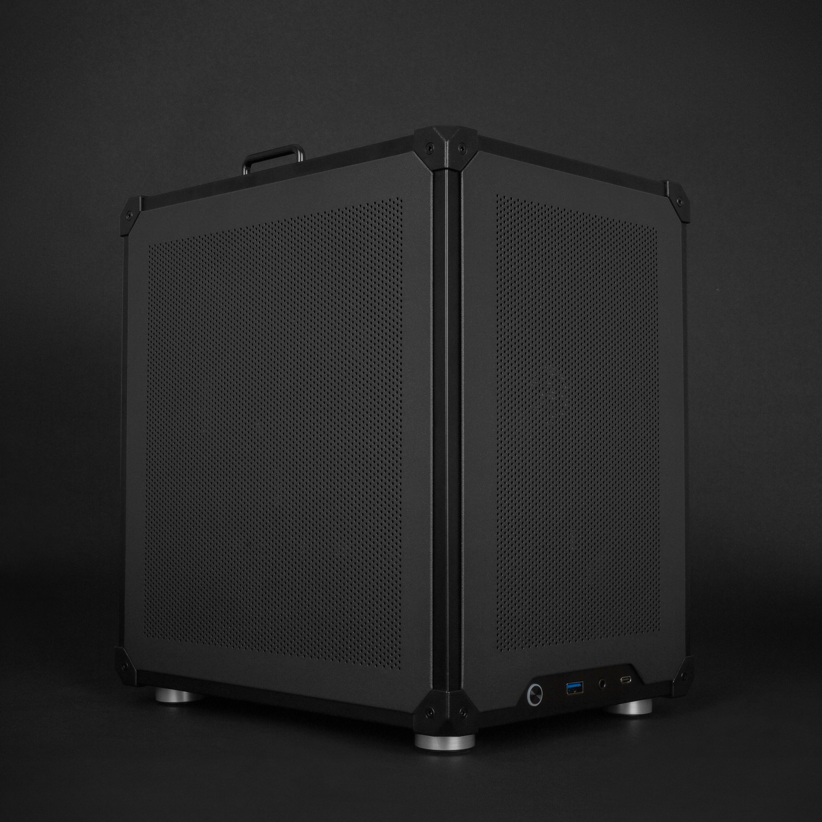 Raster Zero compact gaming PC with front USB and USB-C ports visible.