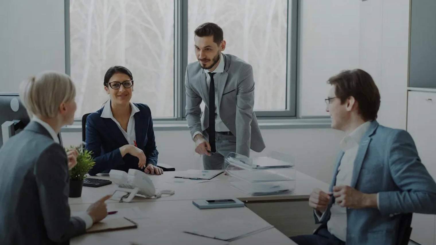 Business professionals collaborating around a conference table