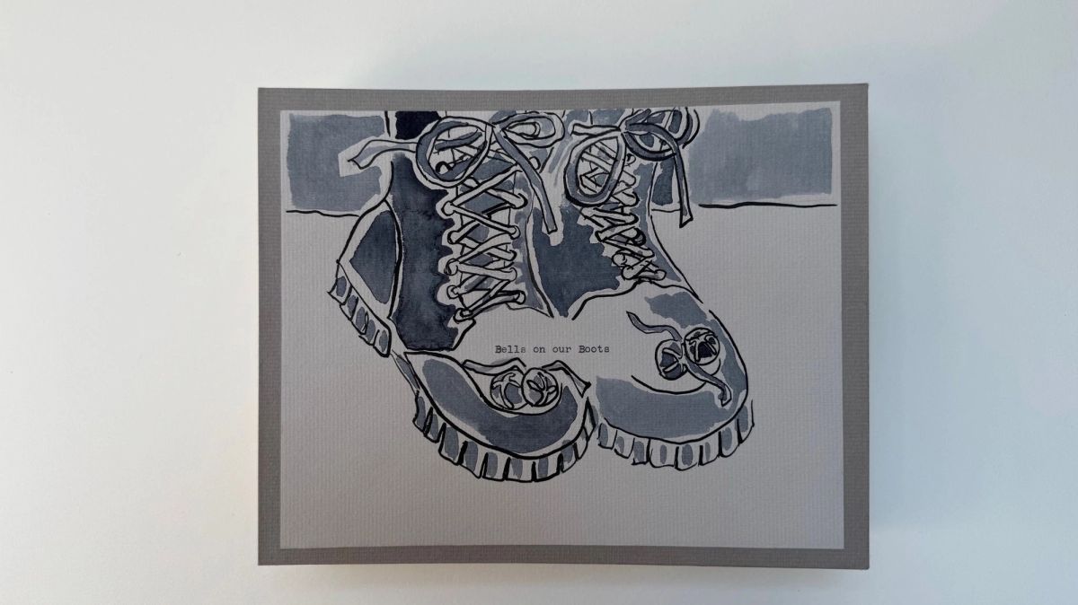 A grey panel holding an ink and wash drawing of two laced winter boots seen from above, small bells tied at the toes. Typed across the centre: "Bells on our Boots".