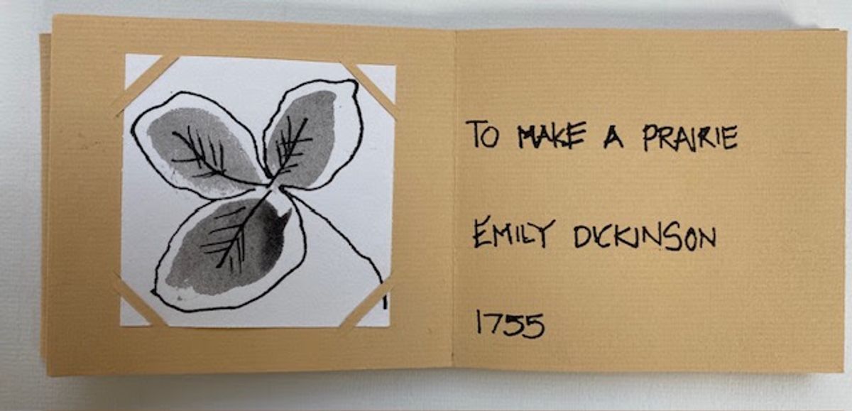 A zine spread on warm kraft card. A grey ink-wash drawing of a three-lobed leaf is corner-mounted on white; opposite, hand-lettered capitals read "TO MAKE A PRAIRIE / EMILY DICKINSON / 1755".