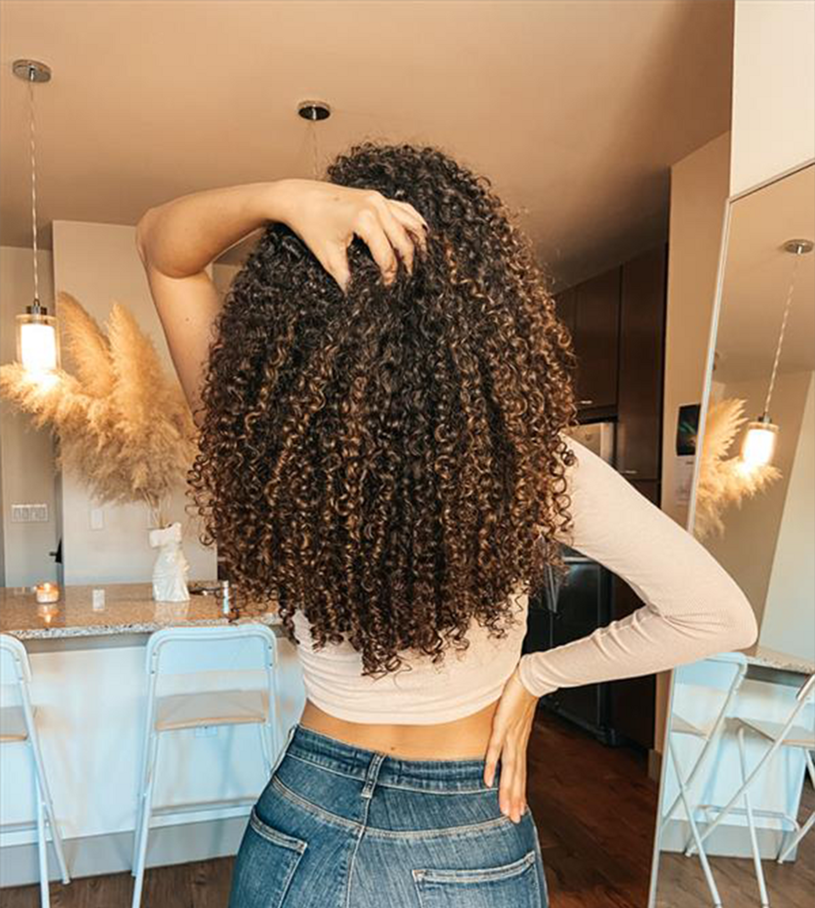 woman with moisturized Curly hair