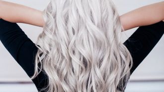 model with long wavy silver hair