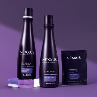 The entire Keraphix Keratin Collection is shown against a purple background.