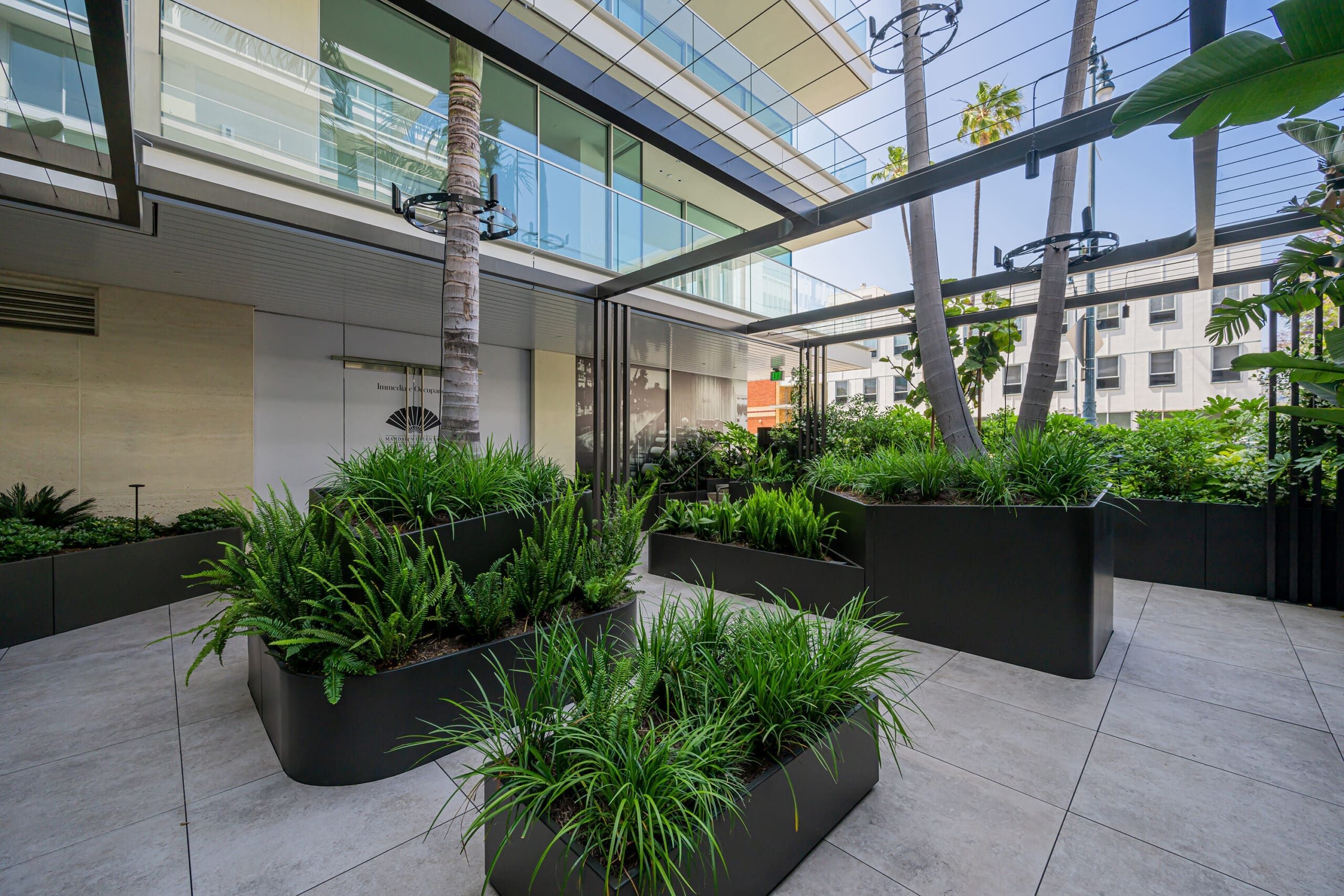 Commercial outdoor planters with custom curves and heights. Preview our Join Modular Planters Canada.