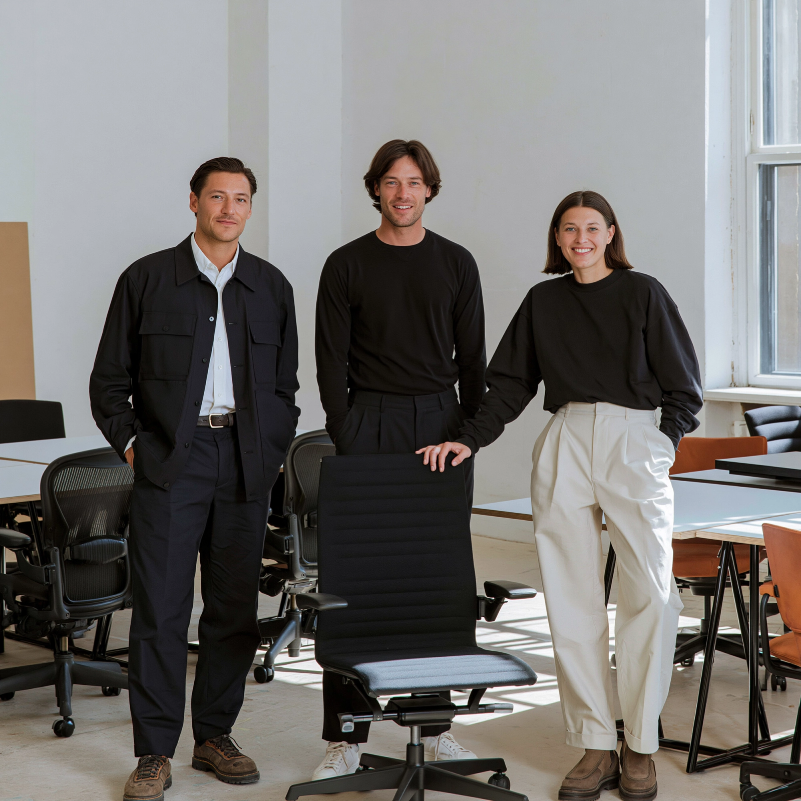 A growing SME office furnished with desks and task chairs.
