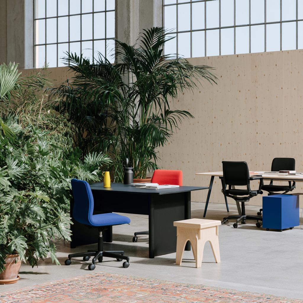 Flexible workspace furniture arranged for changing member needs.