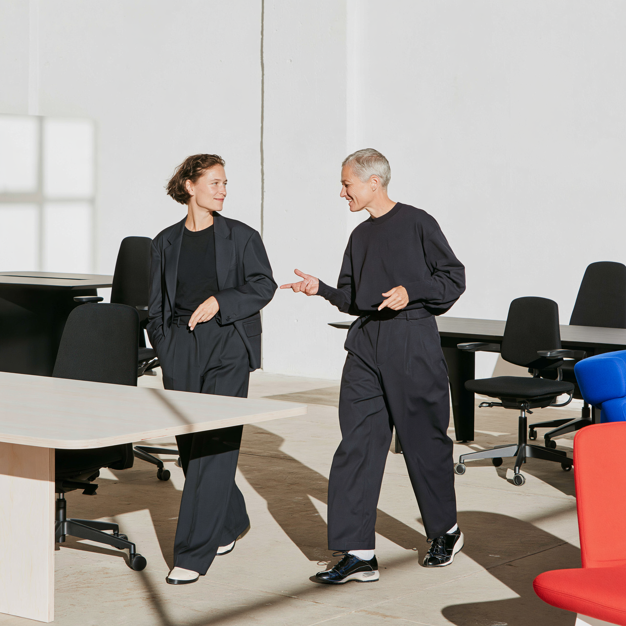 A Relieve sourcing expert checking reused office furniture before delivery