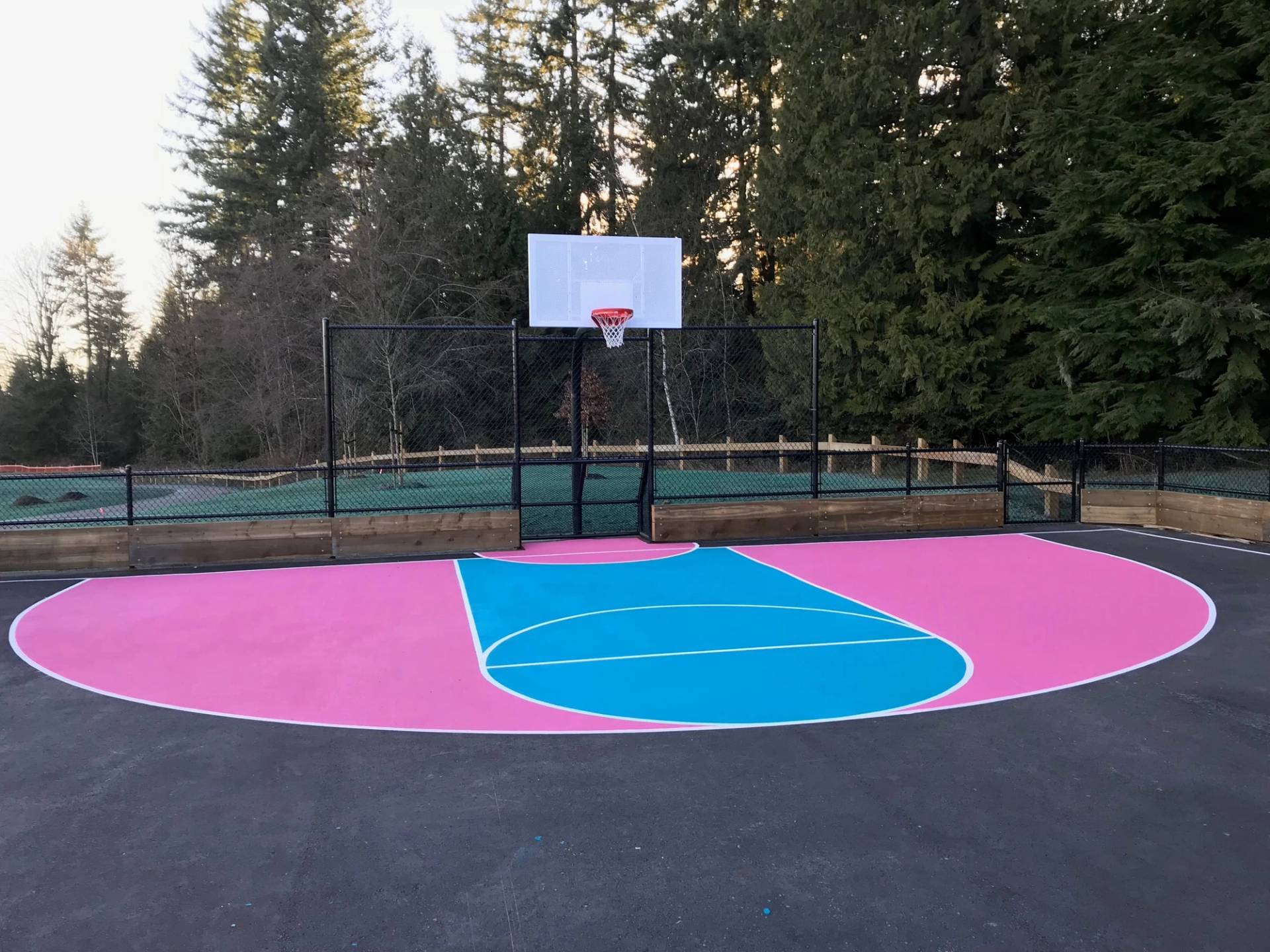 StreetBond pavement coating specified for long-life colour on asphalt and concrete at a coloured crosswalk