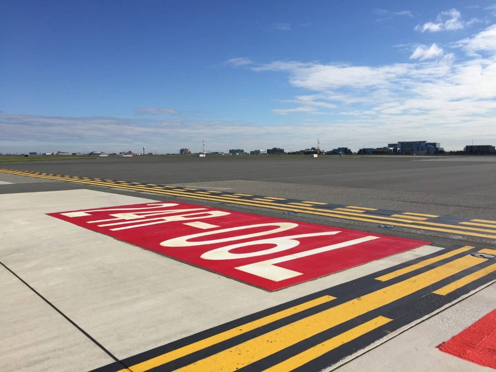 HUB Surface Systems AirMark airfield pavement marking: airport apron and service area marking at an airside road