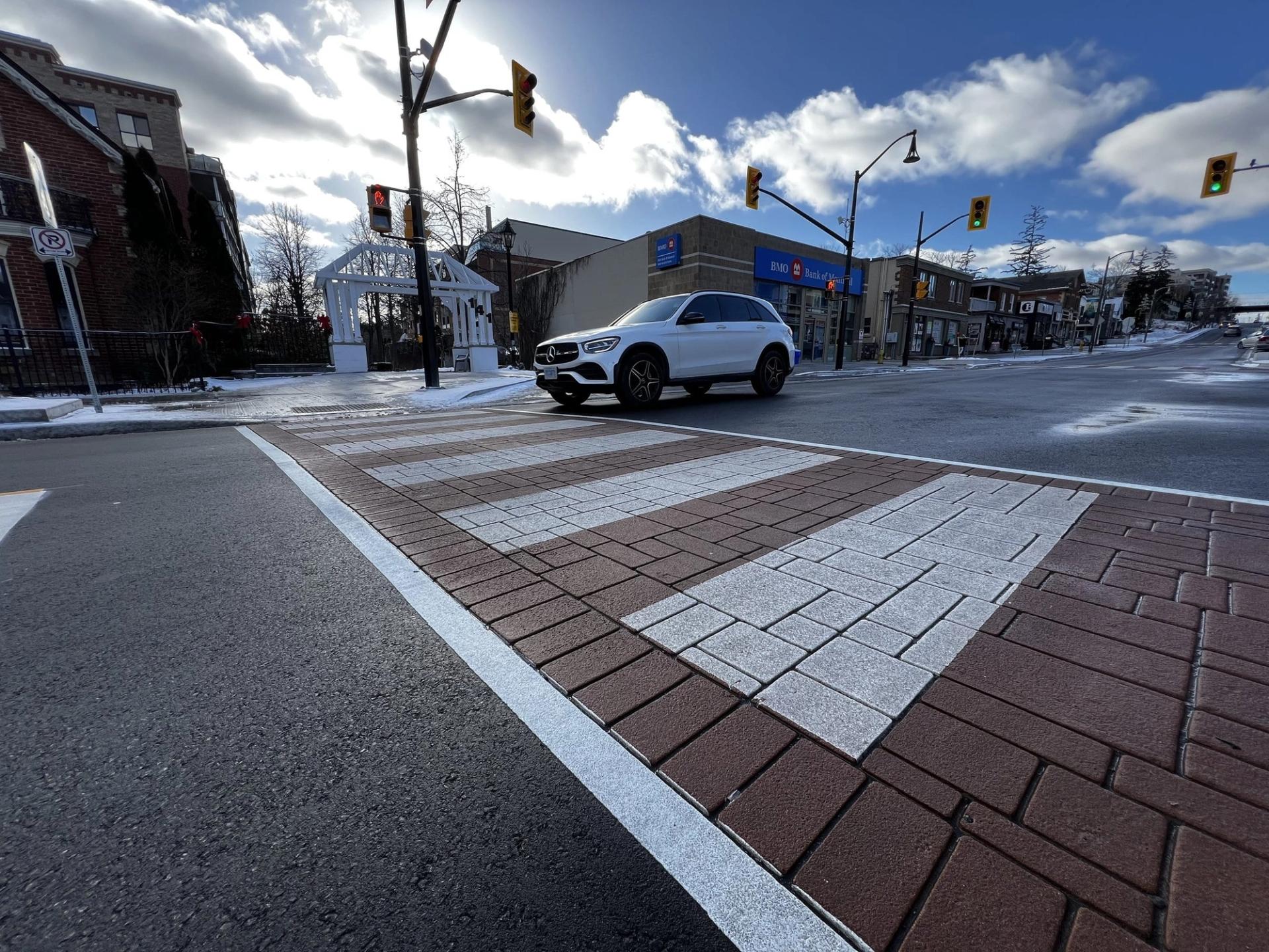 HUB Surface Systems commercial pavement design: retail entrances and commercial site identity at a restaurant patio approach