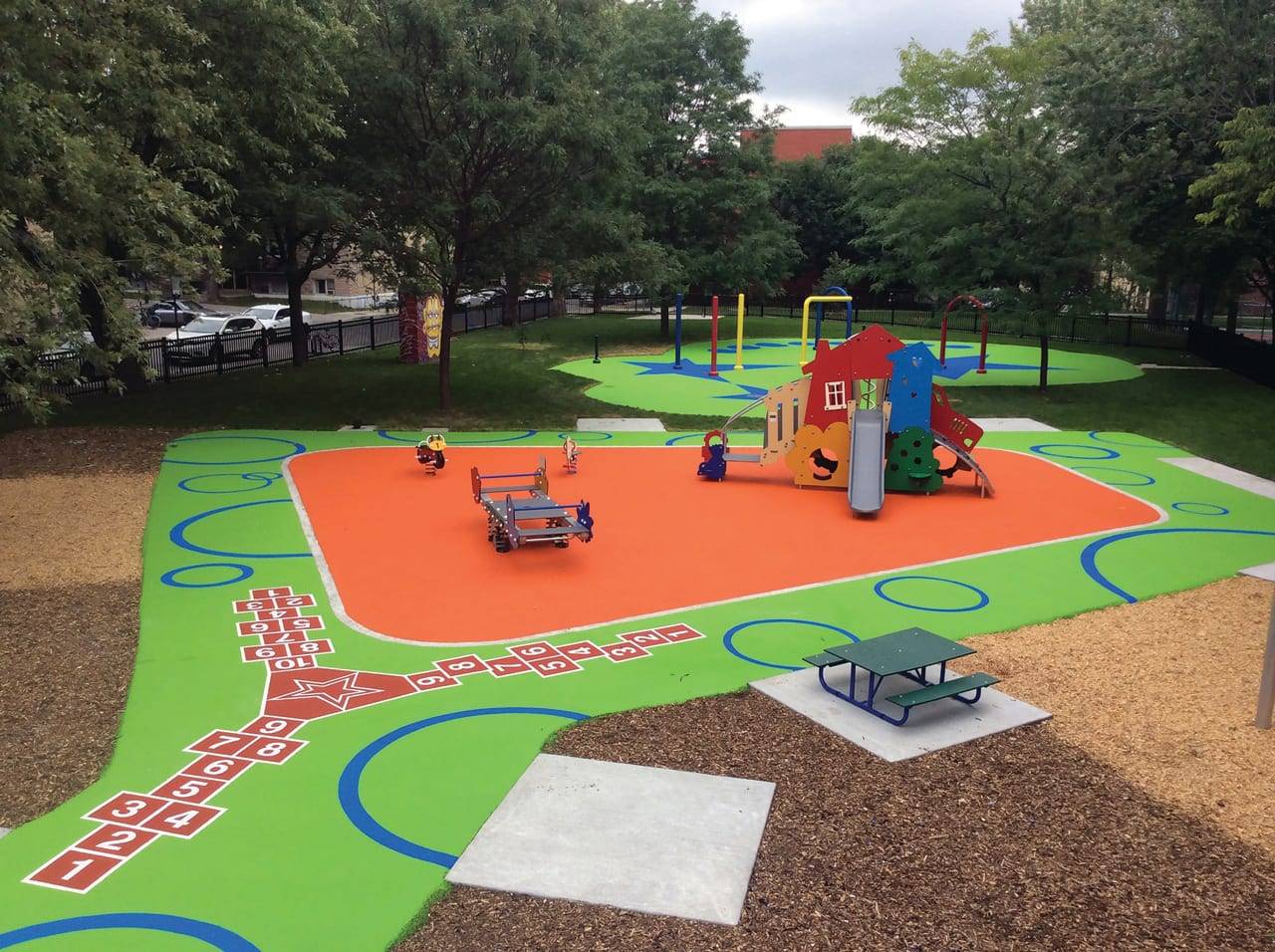 HUB Surface Systems playground surface graphics: play surfaces and schoolyard games at a daycare courtyard