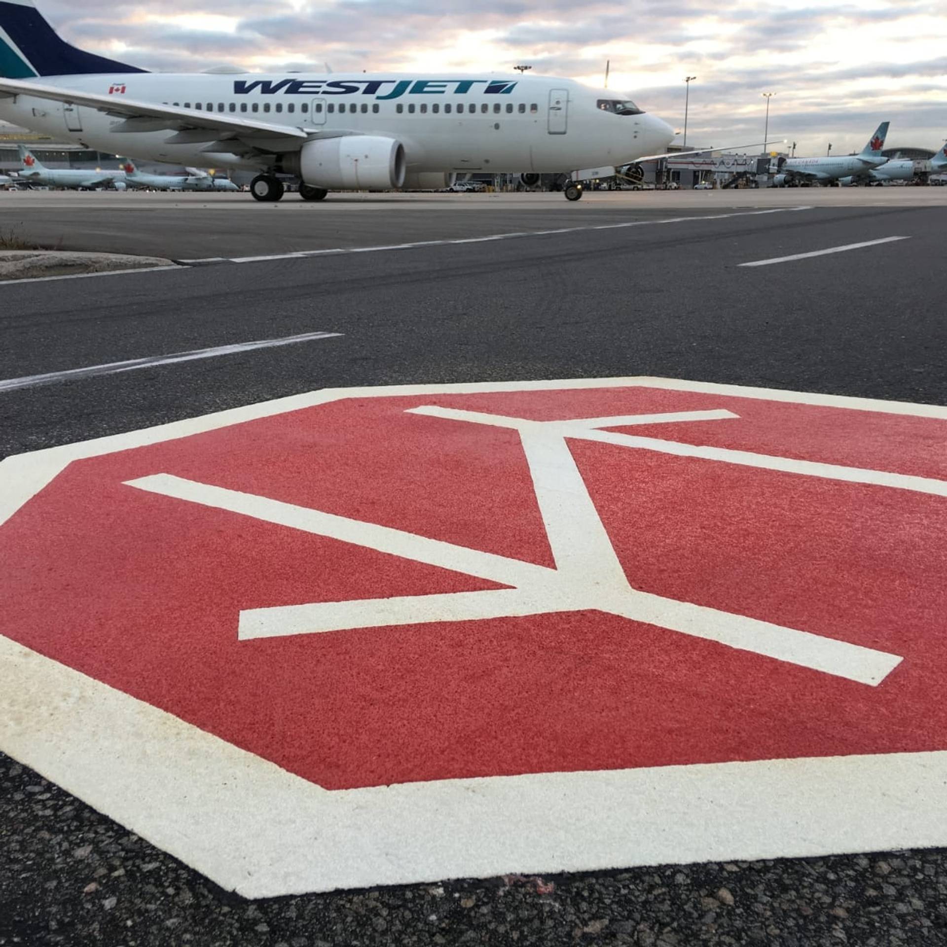 AirMark airfield pavement marking installation in Canada: airport apron and service area marking at an airport apron