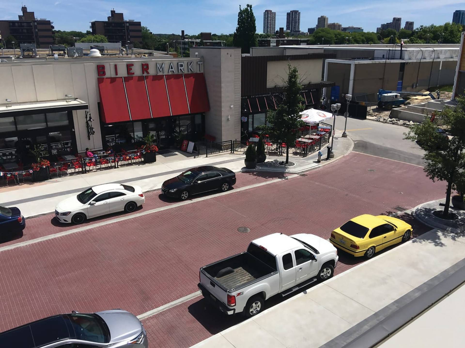 Commercial pavement design installation in Canada: retail entrances and commercial site identity at a restaurant patio approach