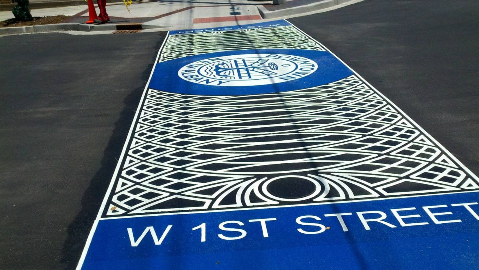 HUB Surface Systems commercial pavement design: retail entrances and commercial site identity at a shopping centre drive aisle