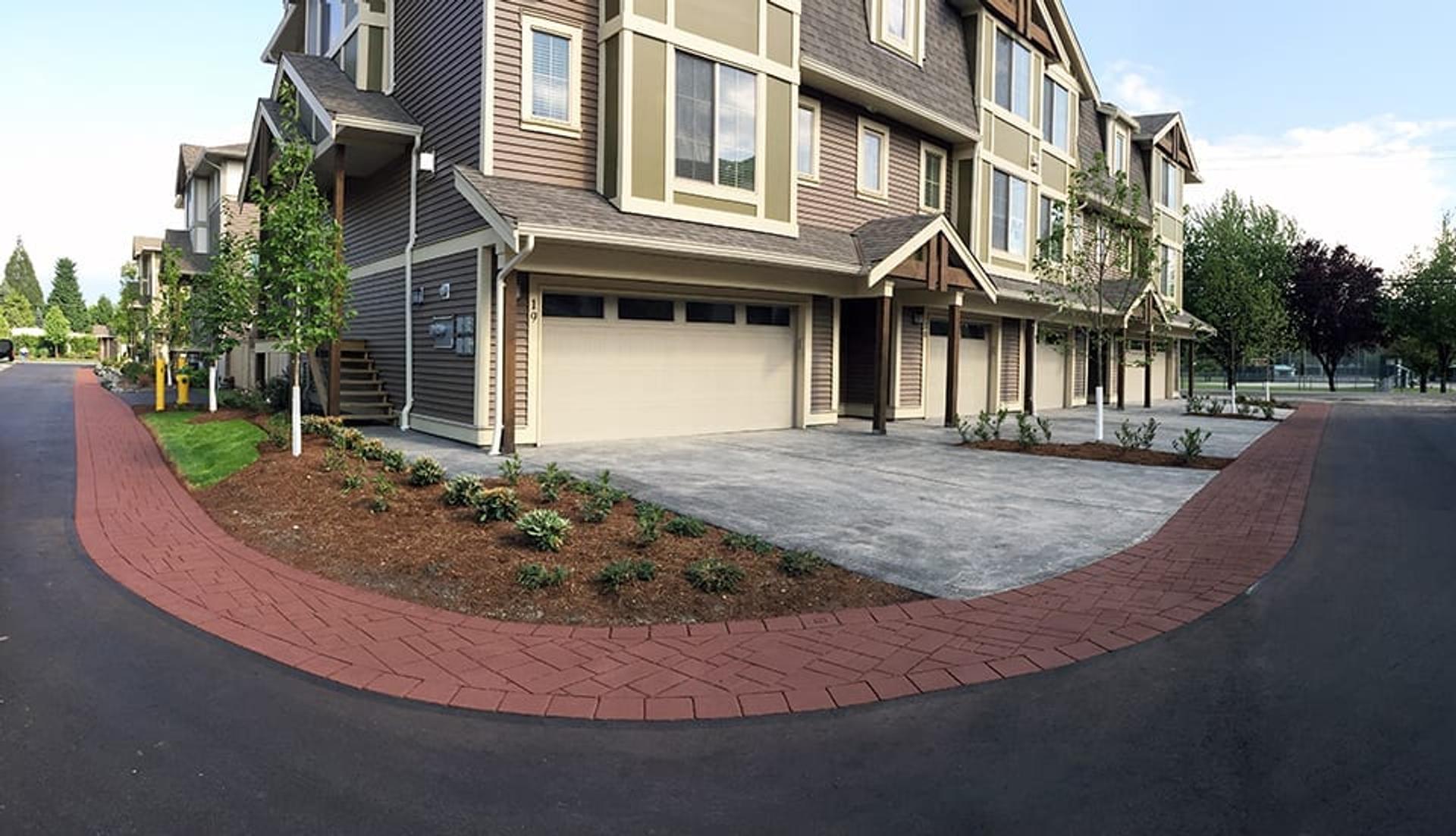 Townhome community paving at a townhome development in Canada — installed by HUB Surface Systems
