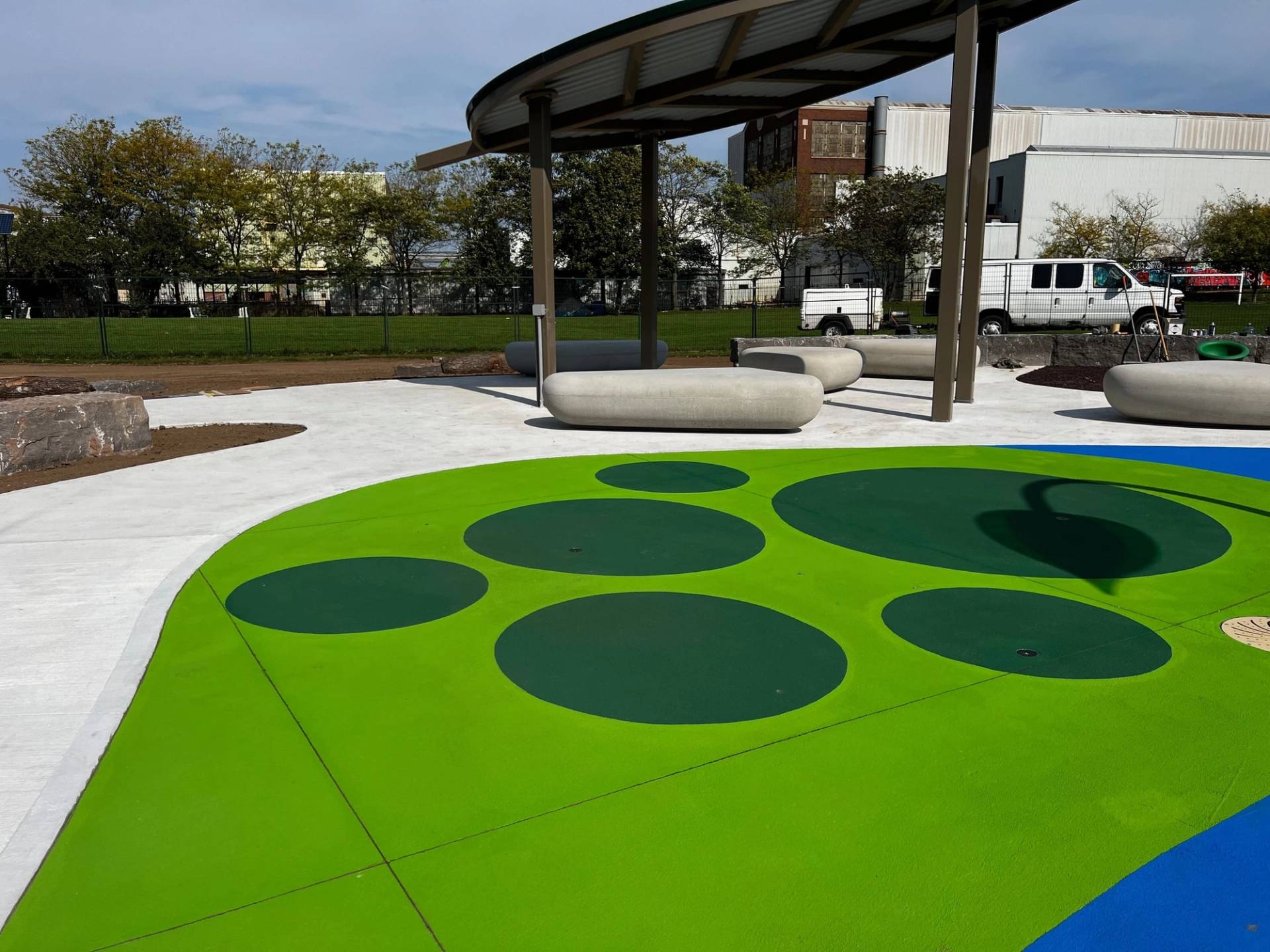 StreetBond pavement coating specified for long-life colour on asphalt and concrete at a plaza surface