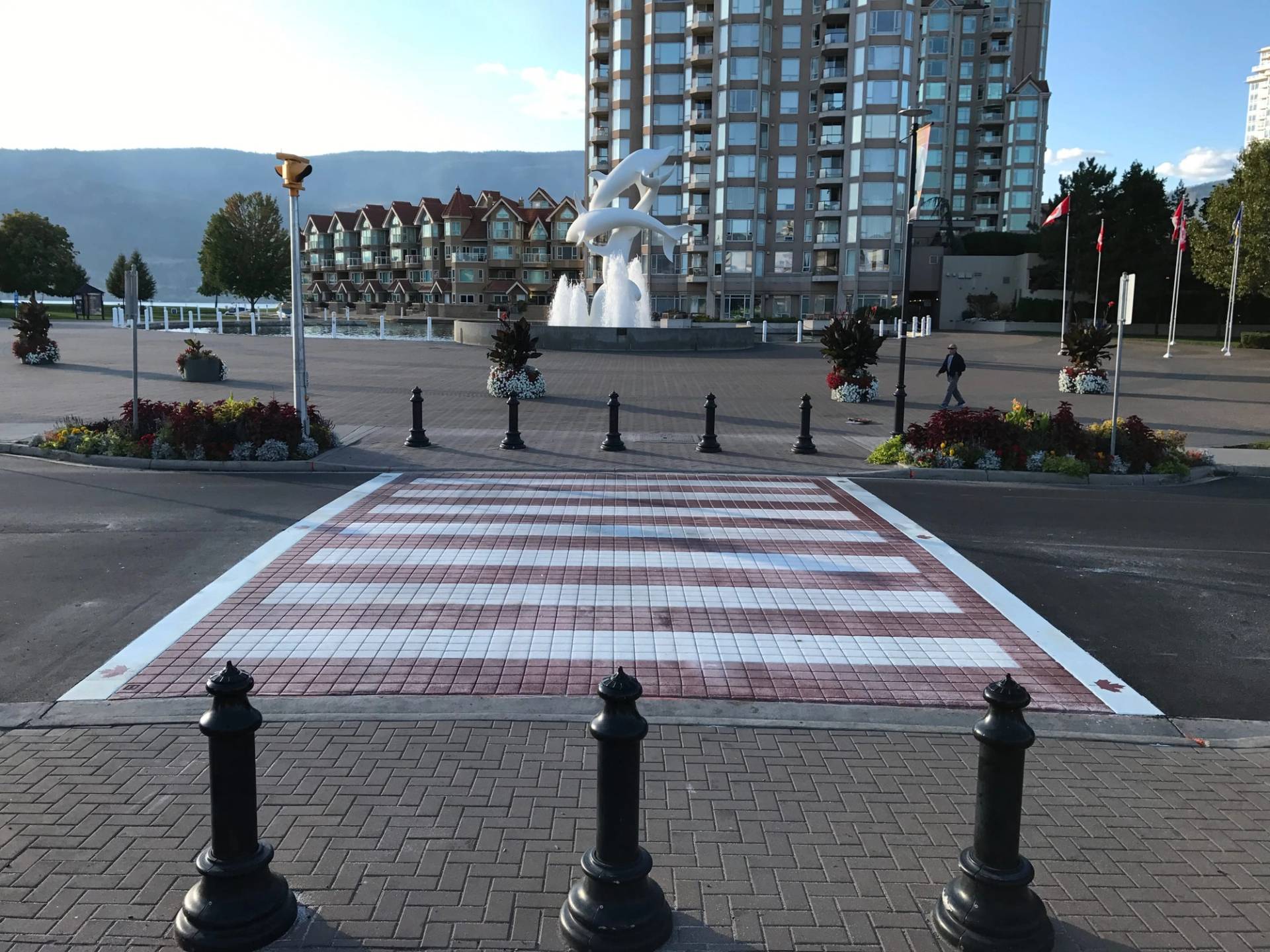 Decorative crosswalk specified for high-visibility pedestrian crossing at a residential collector road
