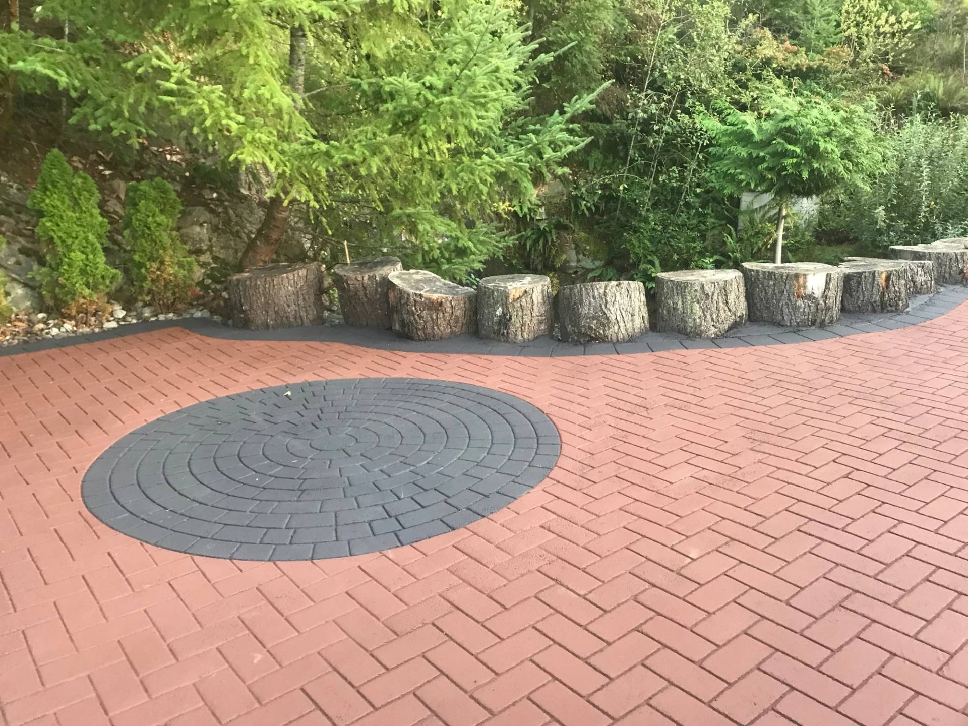 HUB Surface Systems StreetPrint stamped asphalt — brick and cobblestone appearance in asphalt at a village main street