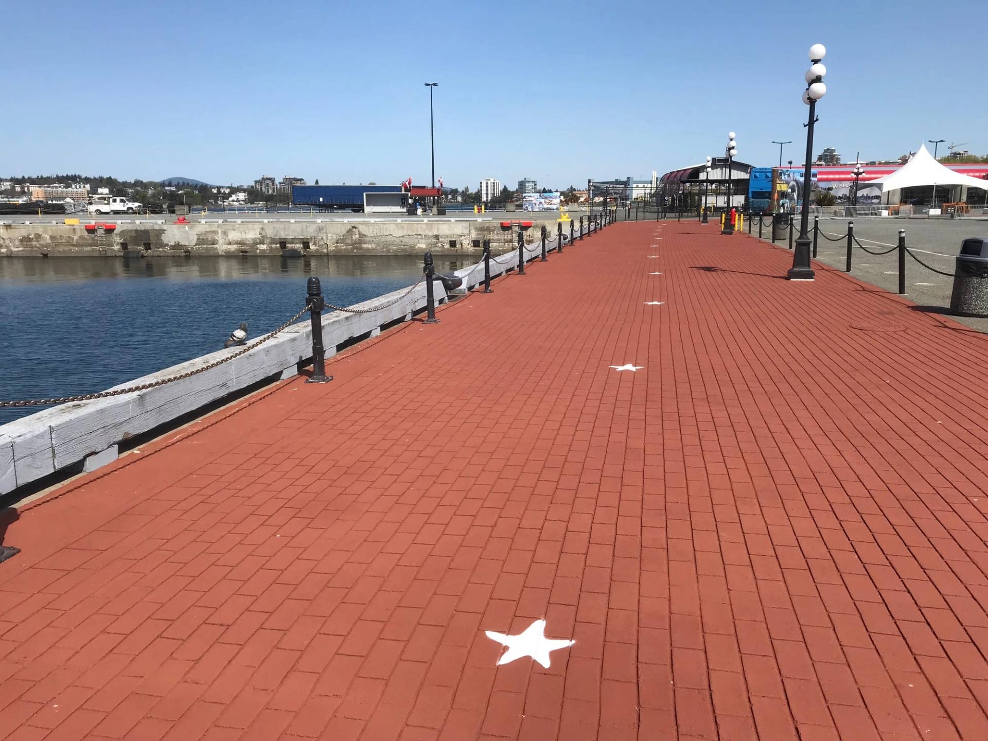 StreetPrint stamped asphalt at a crosswalk in Canada — installed by HUB Surface Systems