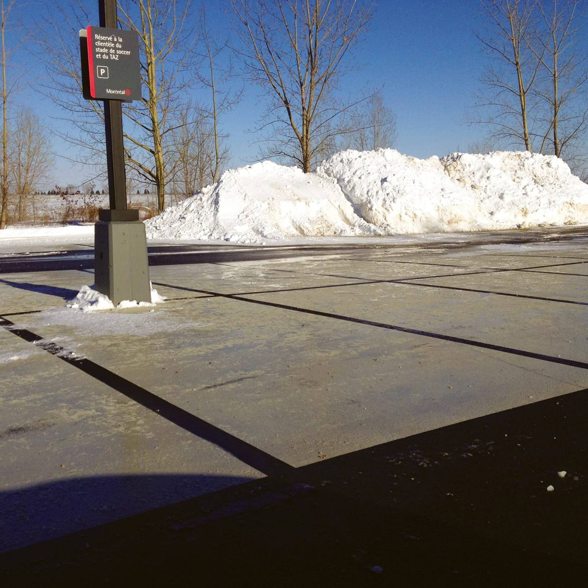 StreetBondSR solar-reflective coating installation in Canada: surface temperature reduction and LEED credit at a plaza