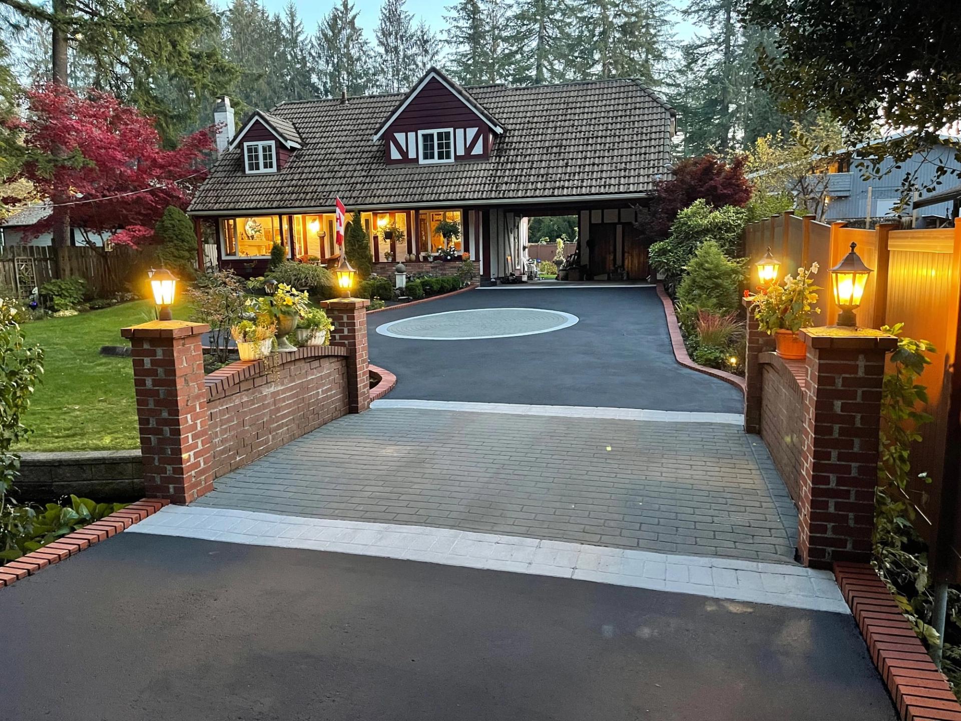 HUB Surface Systems stamped asphalt driveway — driveway surfacing with a paver appearance at a suburban home