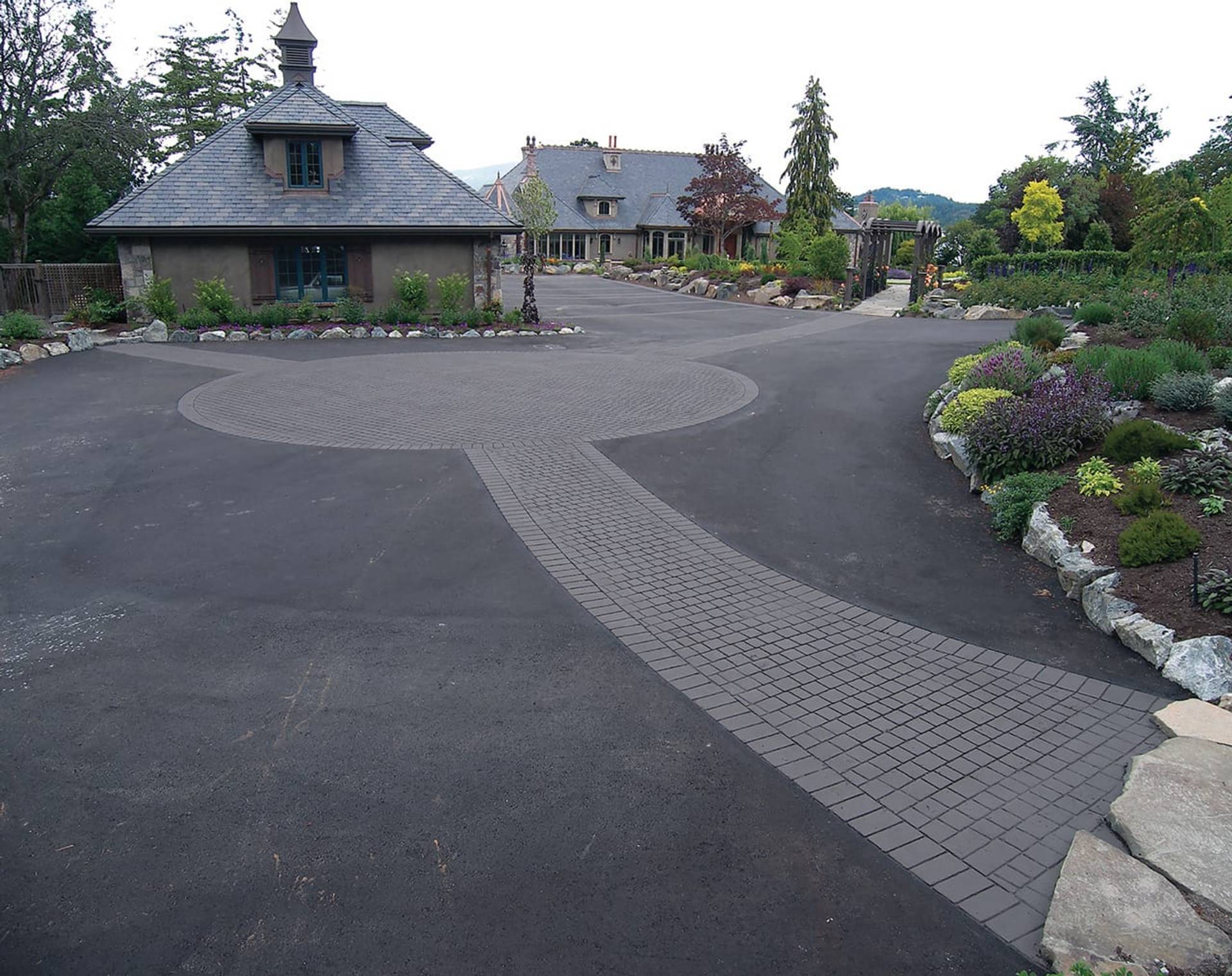 Stamped asphalt driveway at a new-build subdivision in Canada, installed by HUB Surface Systems