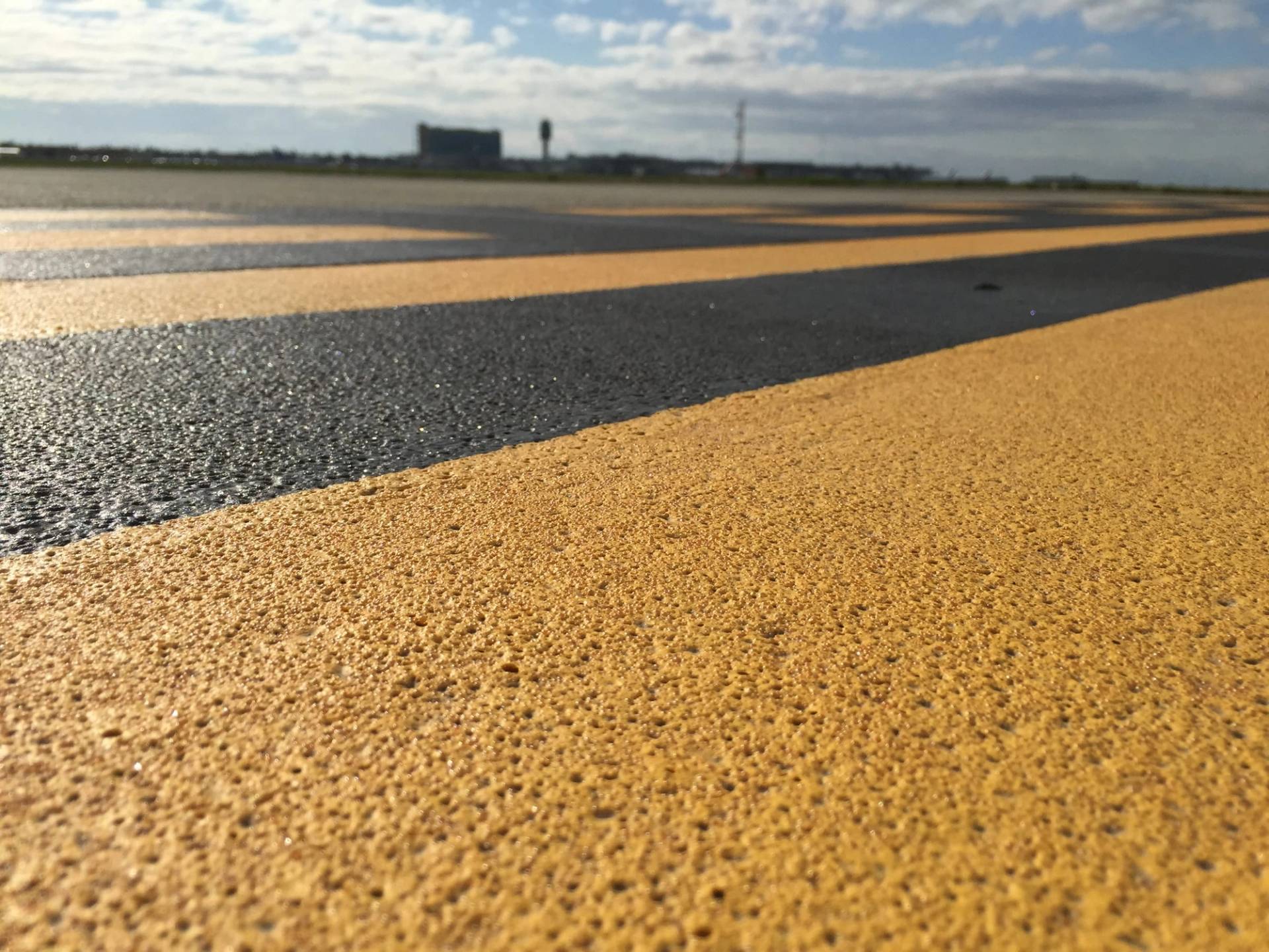 Airport pavement marking specified for apron and airside service area marking at an airport apron