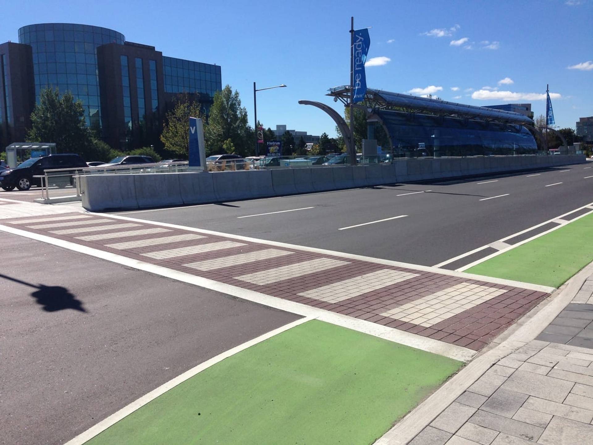 DuraTherm inlaid thermoplastic in preformed thermoplastic inlaid flush with the asphalt at a pathway, Canada