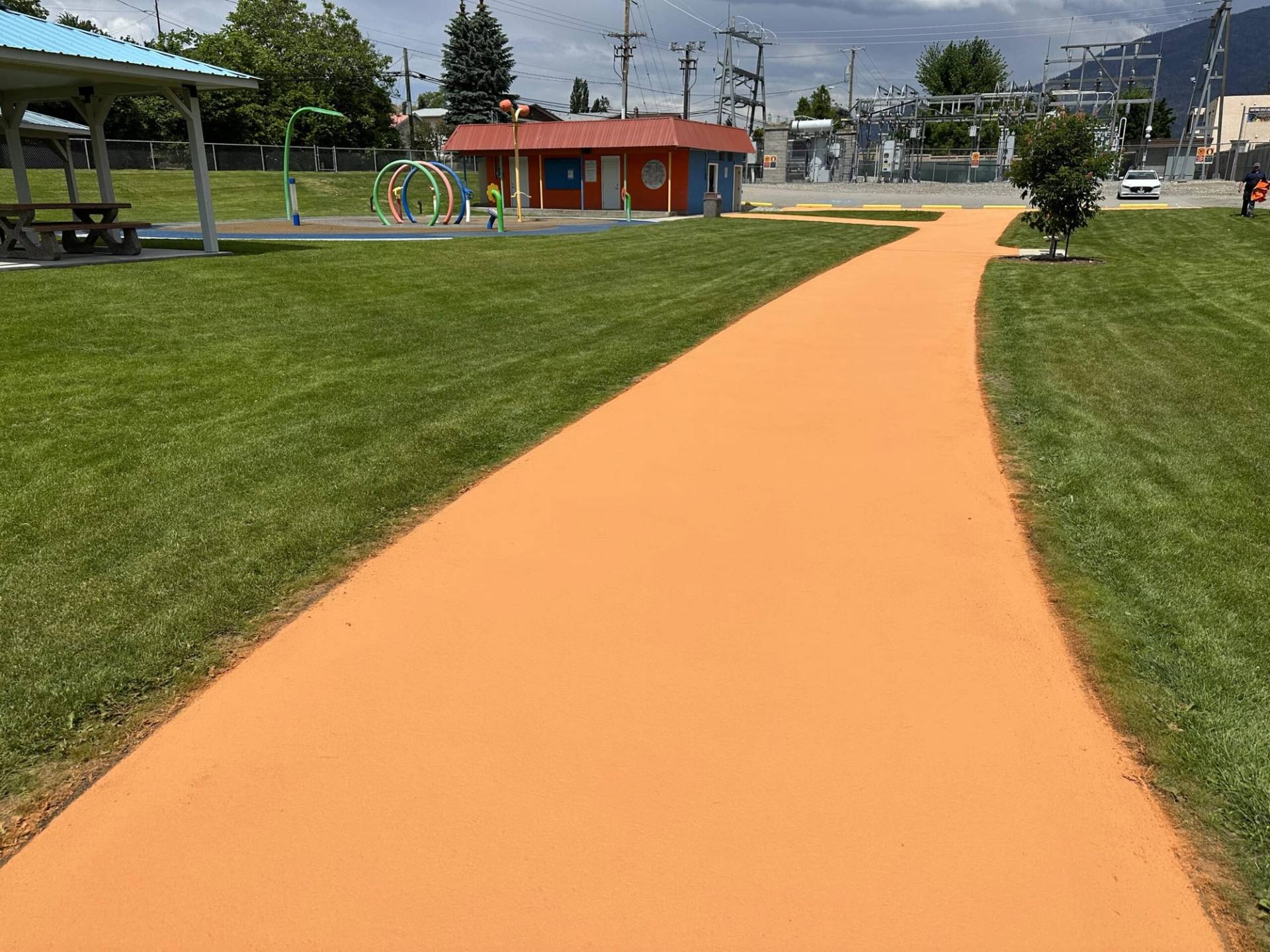 StreetBondSR solar-reflective coating at a pedestrian pathway in Canada, installed by HUB Surface Systems
